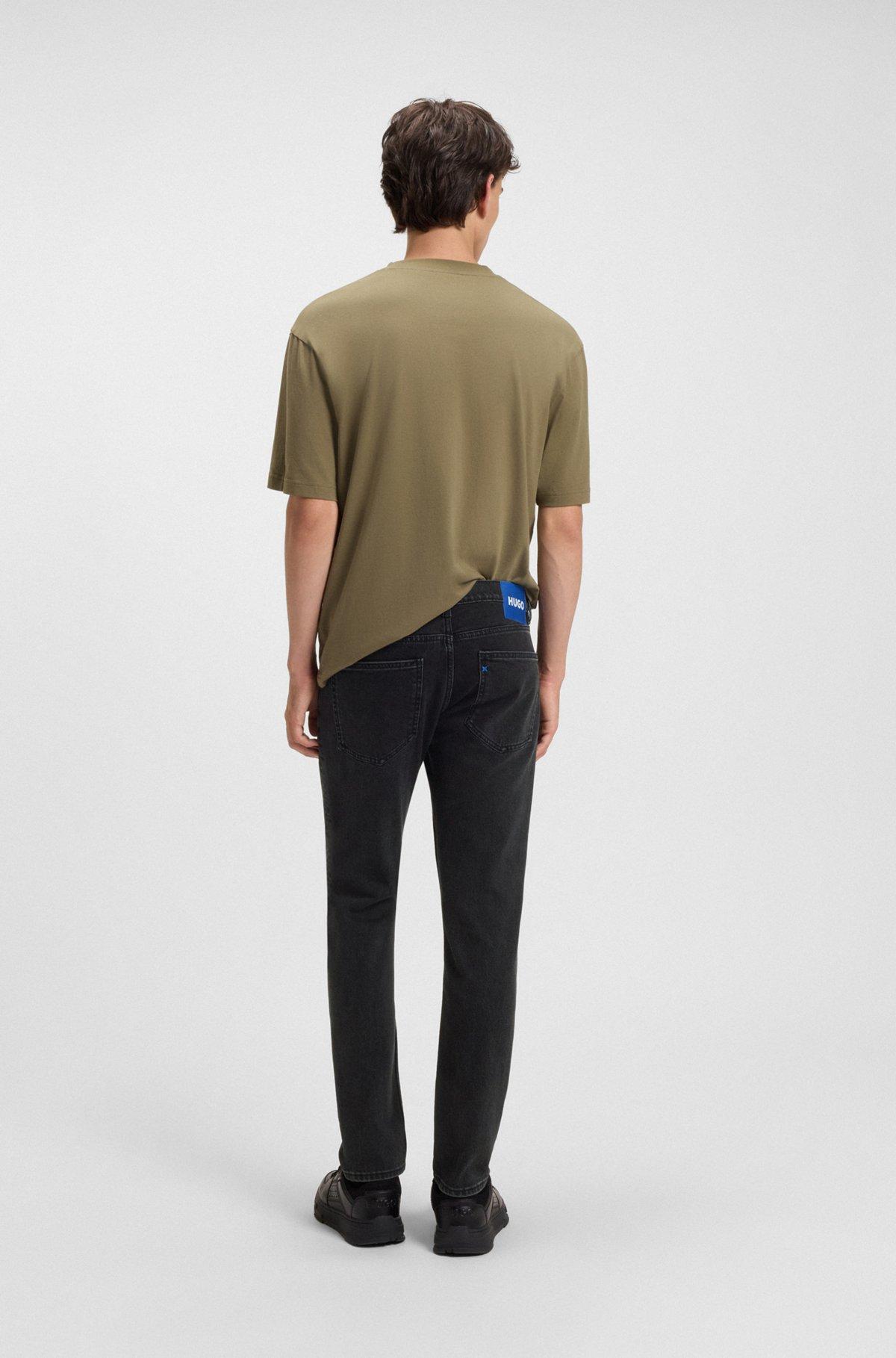 Skinny-fit jeans in washed black denim Product Image
