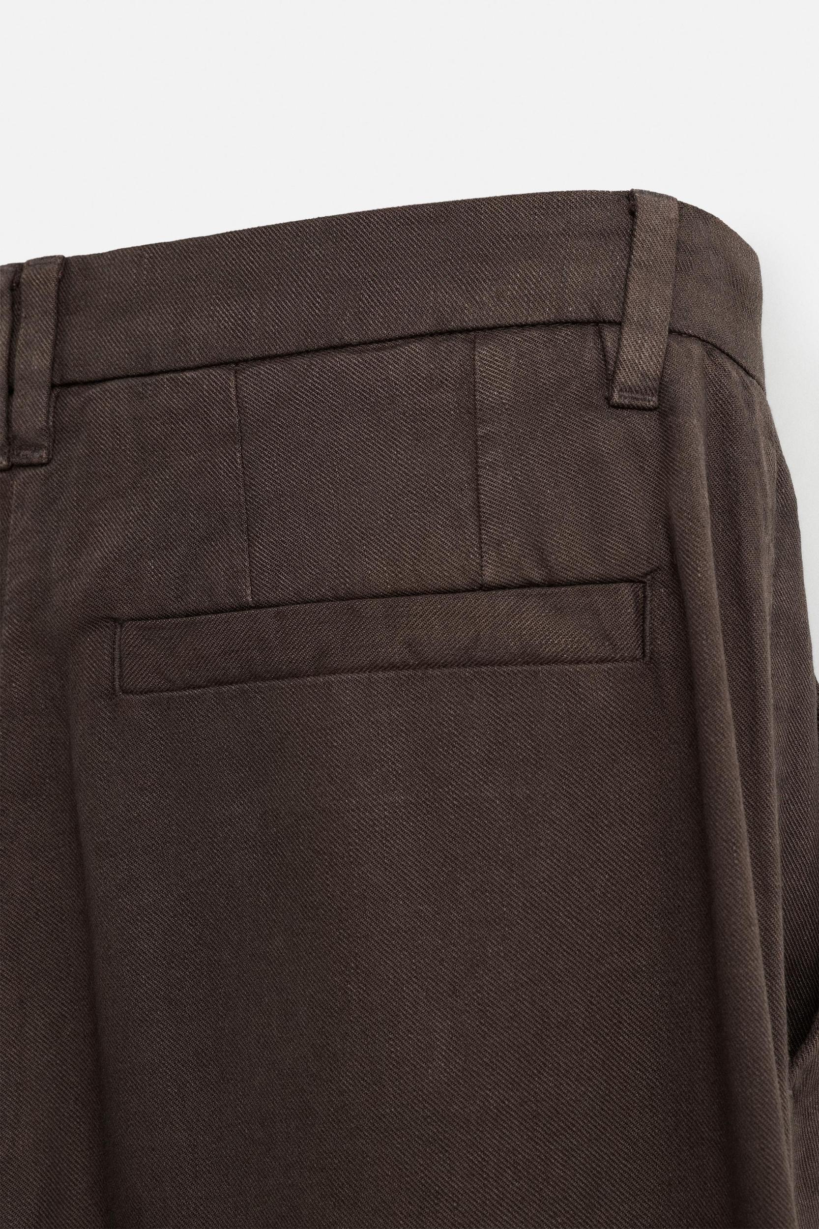 FLOWY PLEATED PANTS Product Image