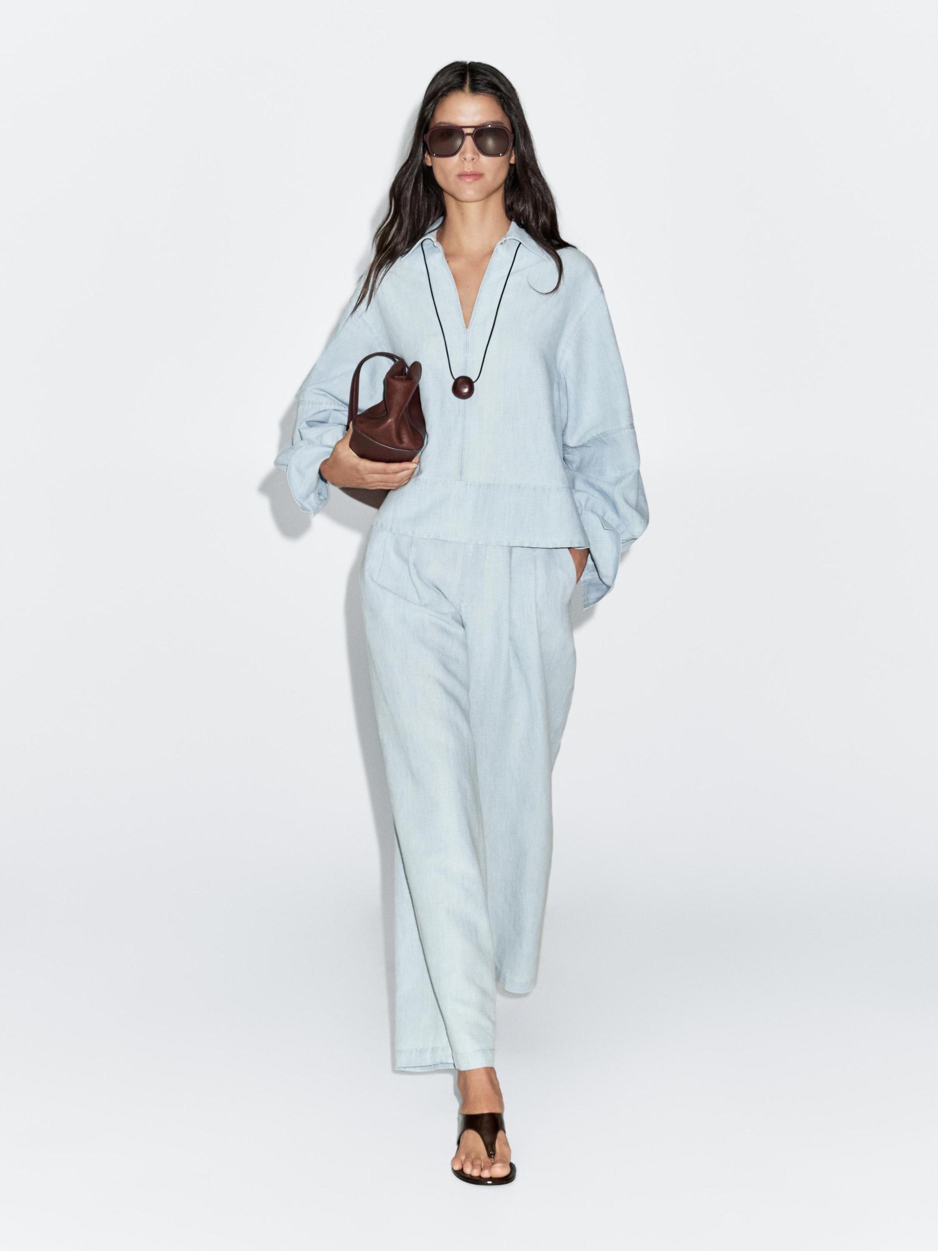 Oversize denim blouse with puff sleeves Product Image