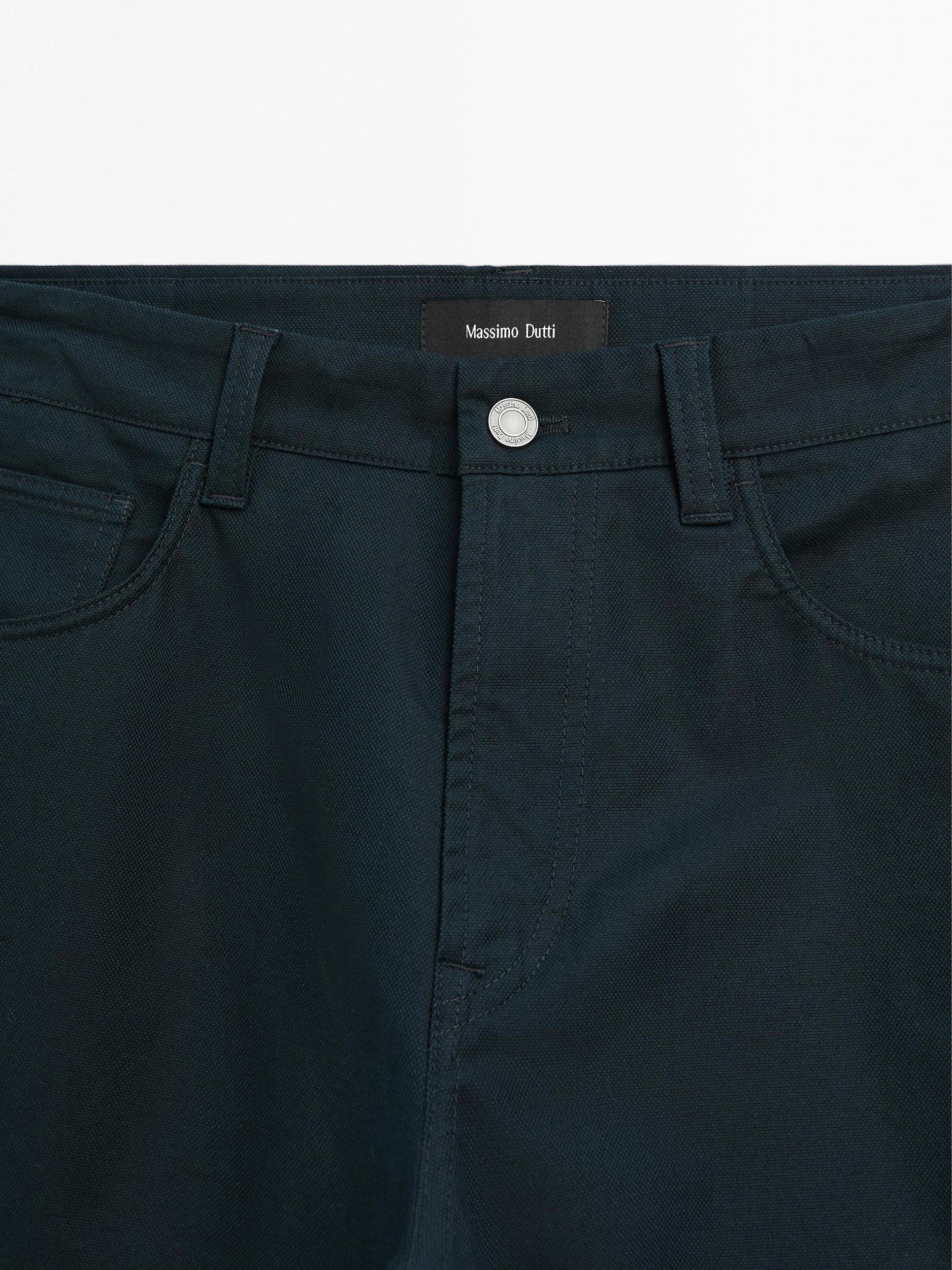 Lightweight tapered fit denim-effect trousers Product Image