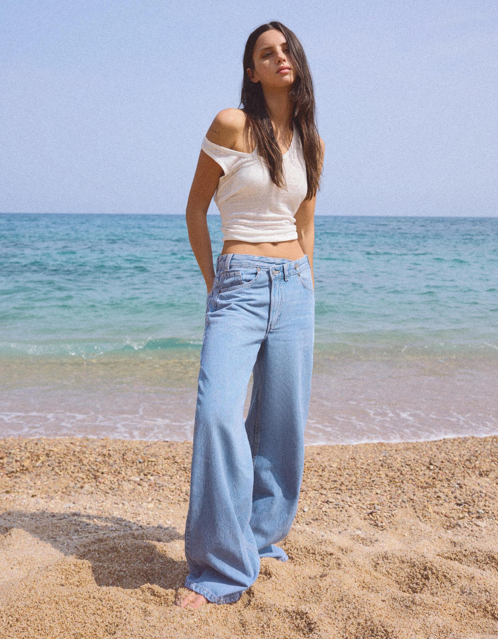 Wide leg jeans with crossover waistband Product Image