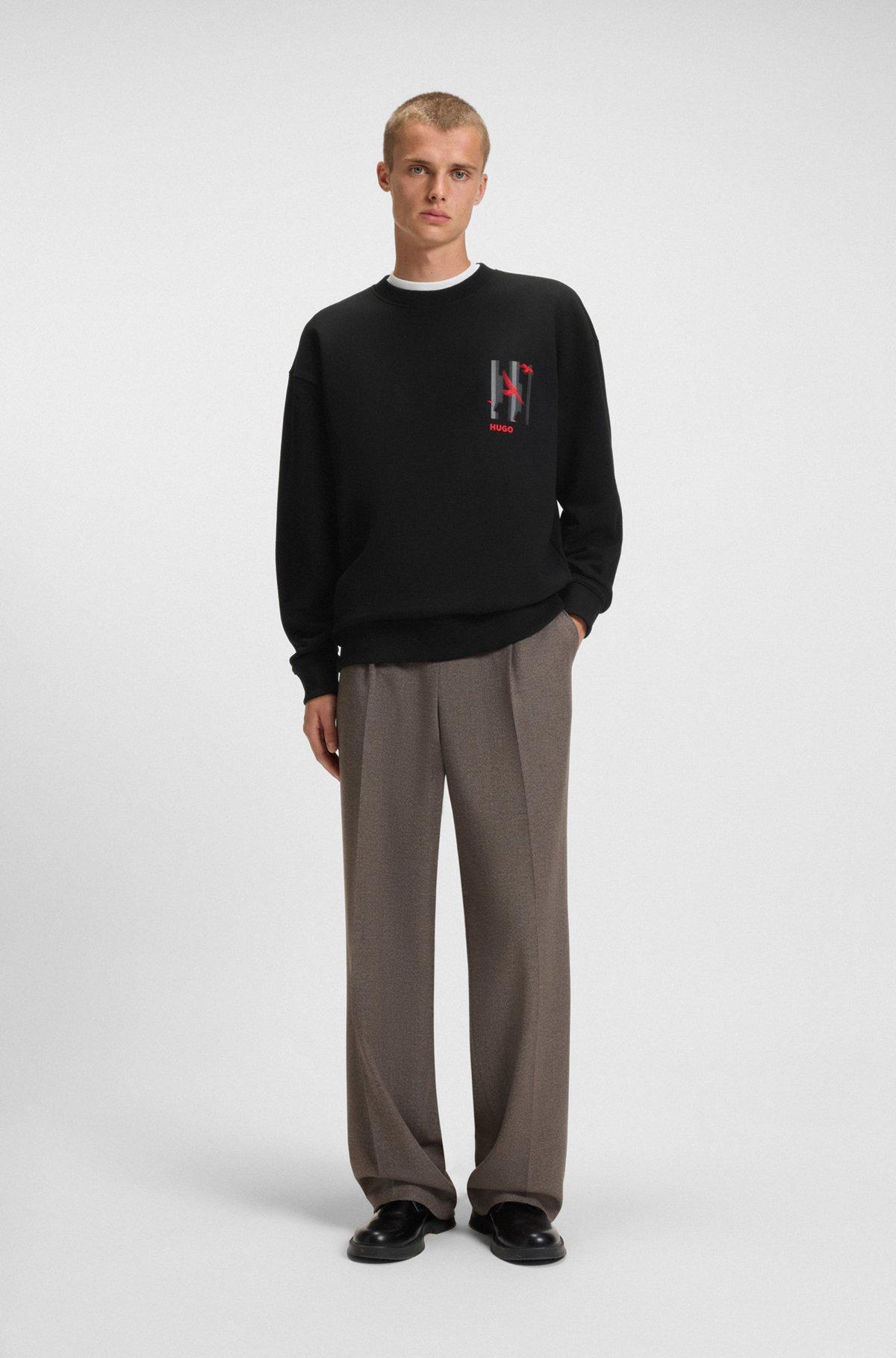 HUGO - Cotton-terry sweatshirt with bird artwork - Black Product Image