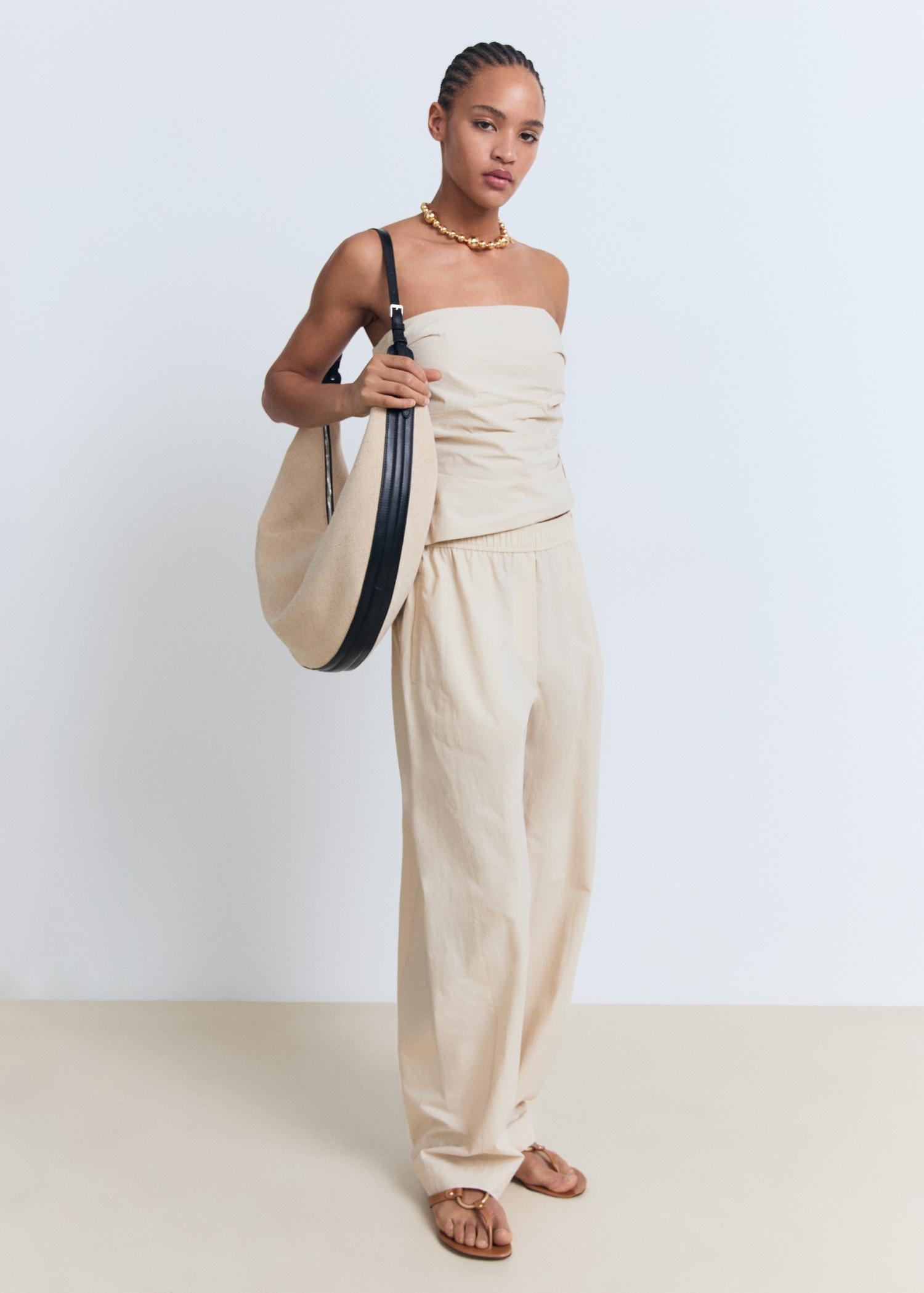 Asymmetrical strapless top - Women | MANGO USA Product Image