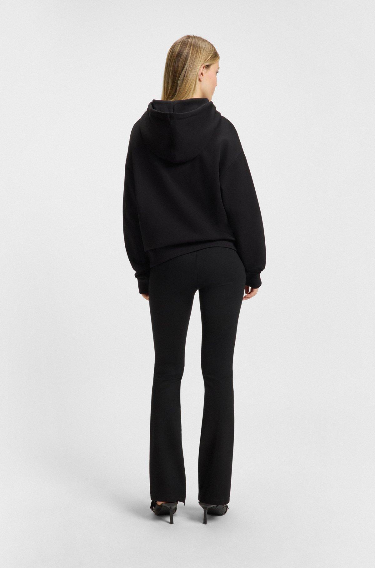 Relaxed-fit trousers in stretch fabric with flared leg Product Image