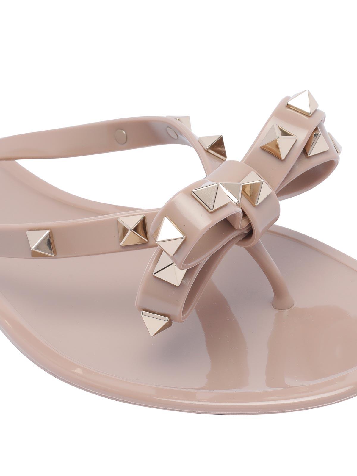 VALENTINO GARAVANI Women Rockstud Rubber Flip Flops In Beige Product Image
