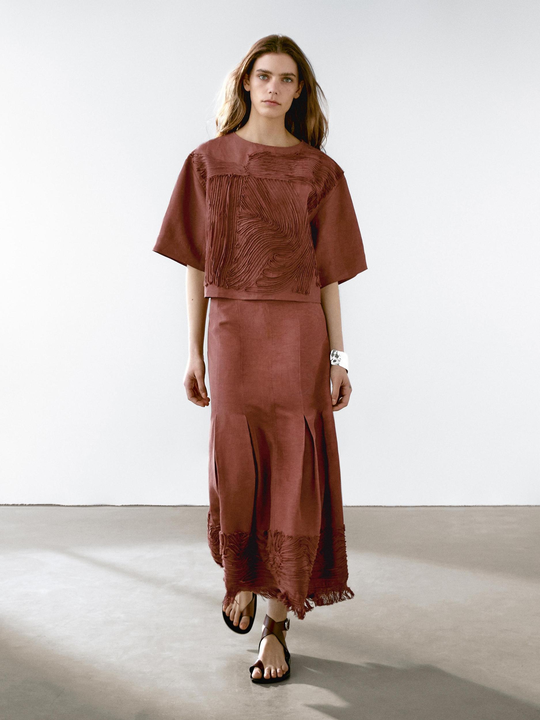 Flowing top with embroidered detail Product Image