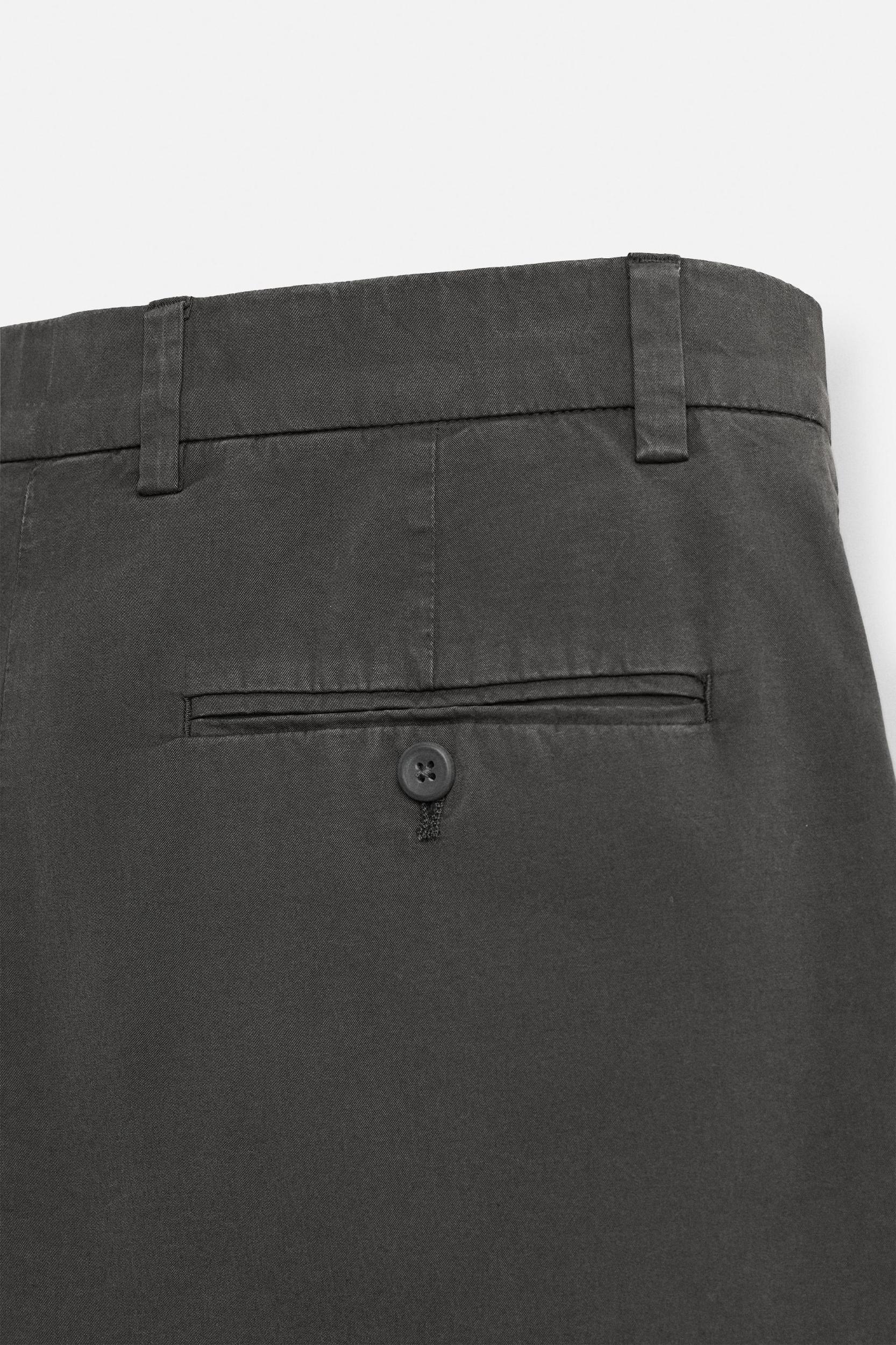 REGULAR FIT PLEATED BERMUDA SHORTS Product Image