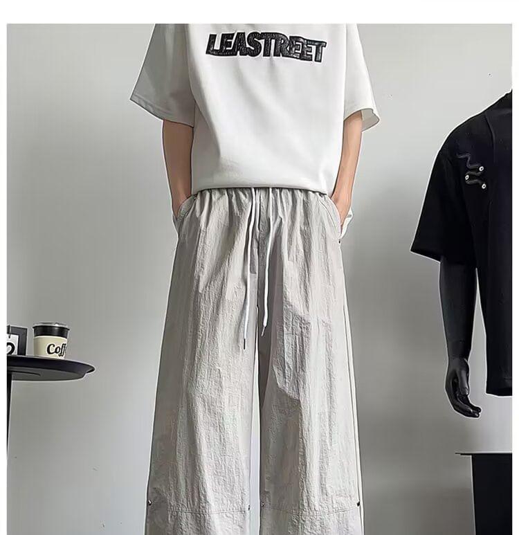 Drawstring Waist Plain Paneled Wide Leg Pants Product Image