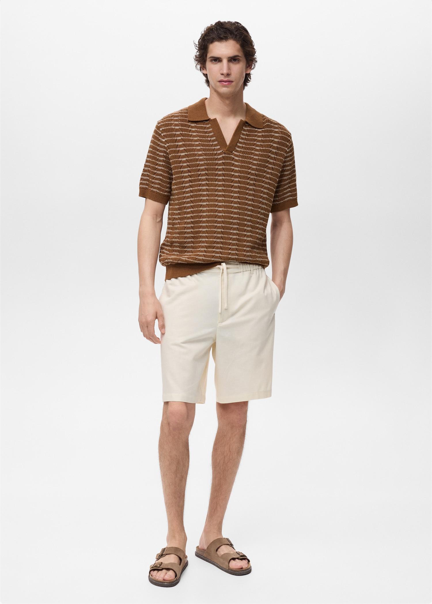 Striped openwork knitted polo shirt - Men | MANGO USA Product Image