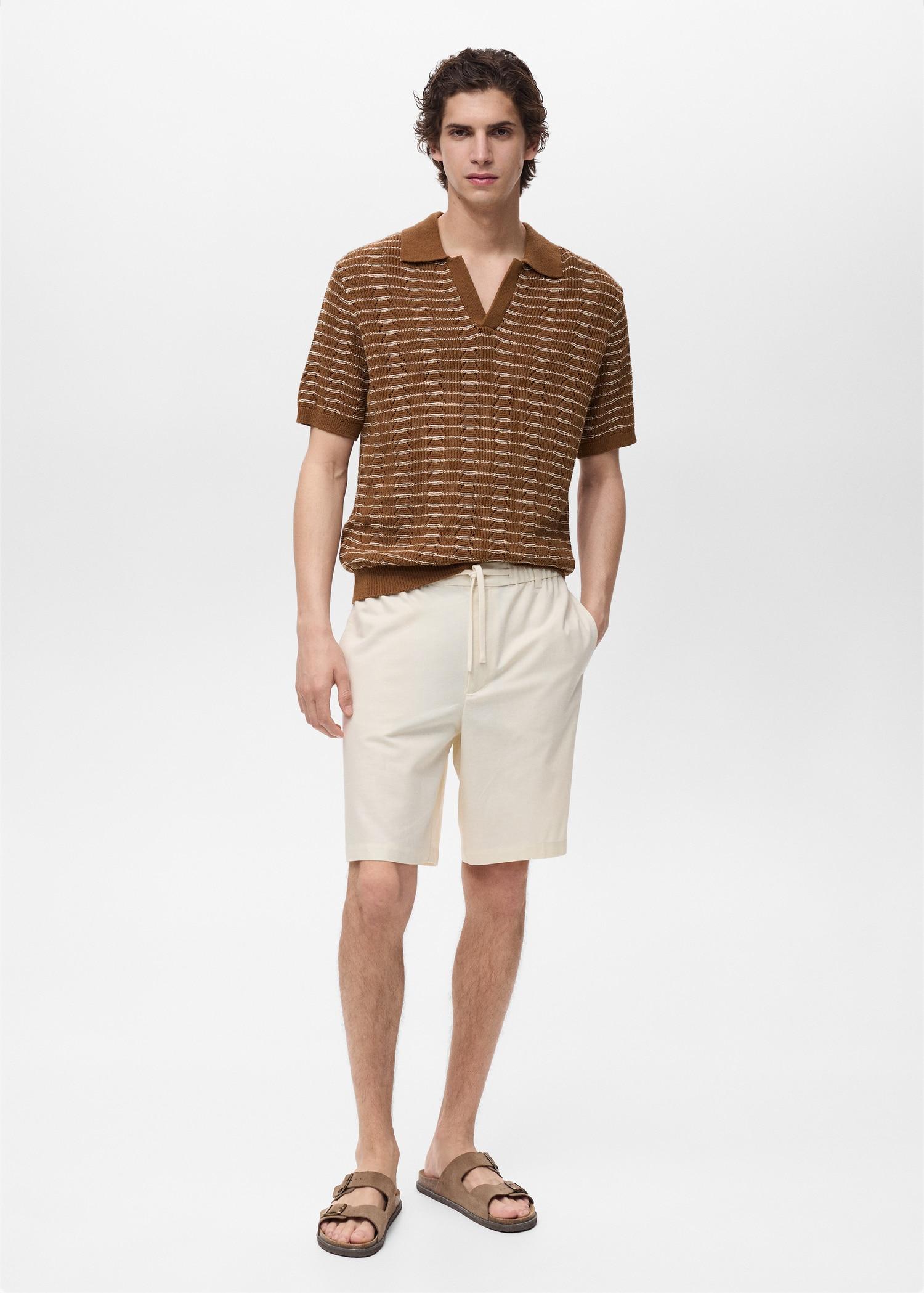 Striped openwork knitted polo shirt - Men | MANGO USA Product Image
