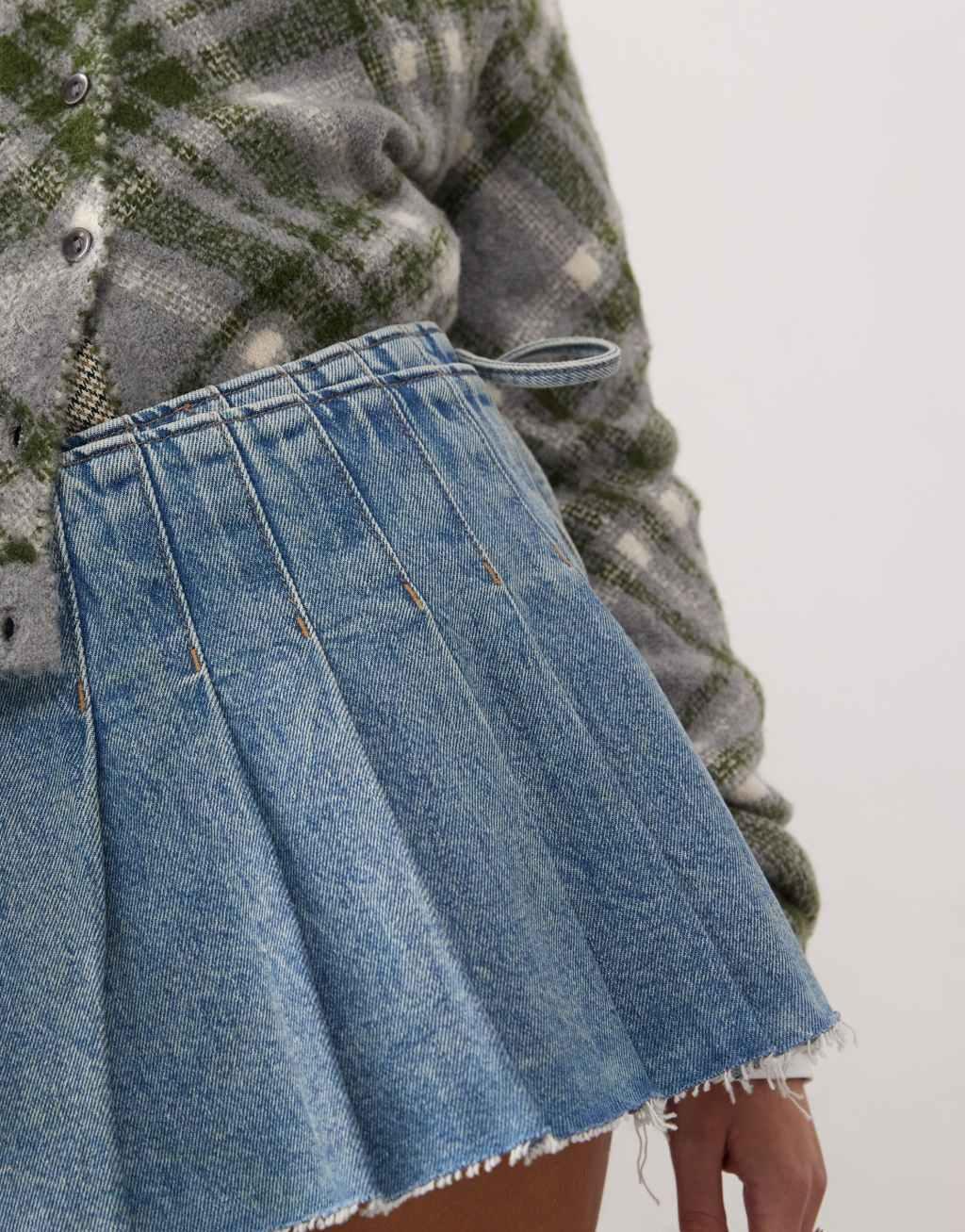 Monki pleated denim mini wrap skirt in mid blue wash Product Image