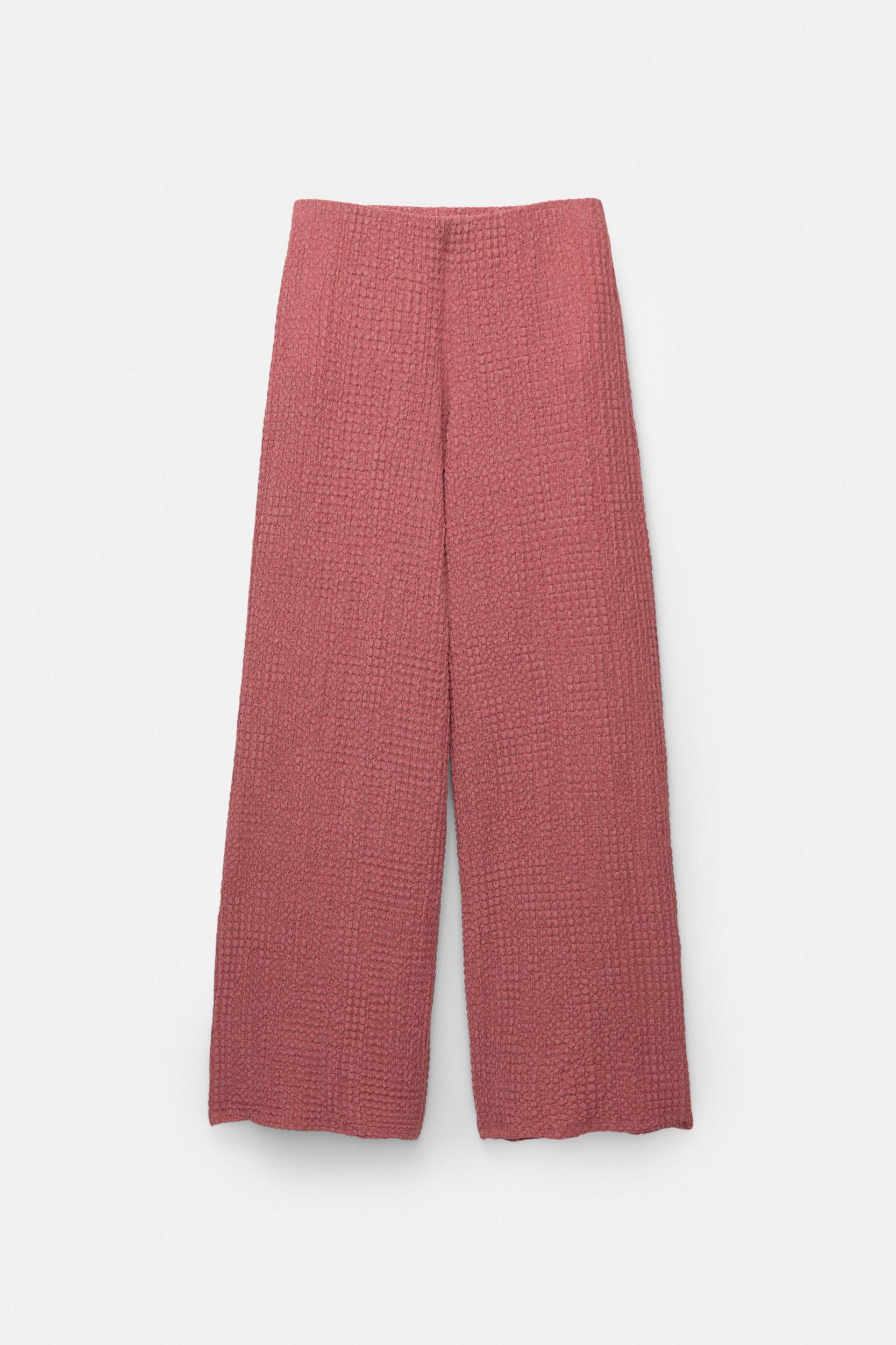 Rustic creased-effect pants Product Image