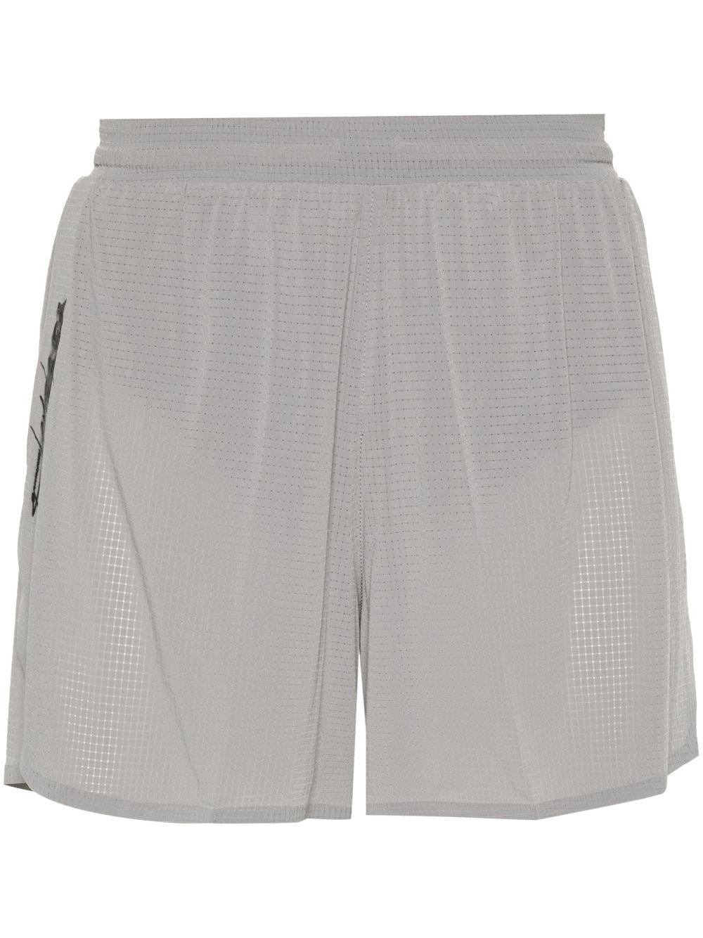 checked running shorts Product Image
