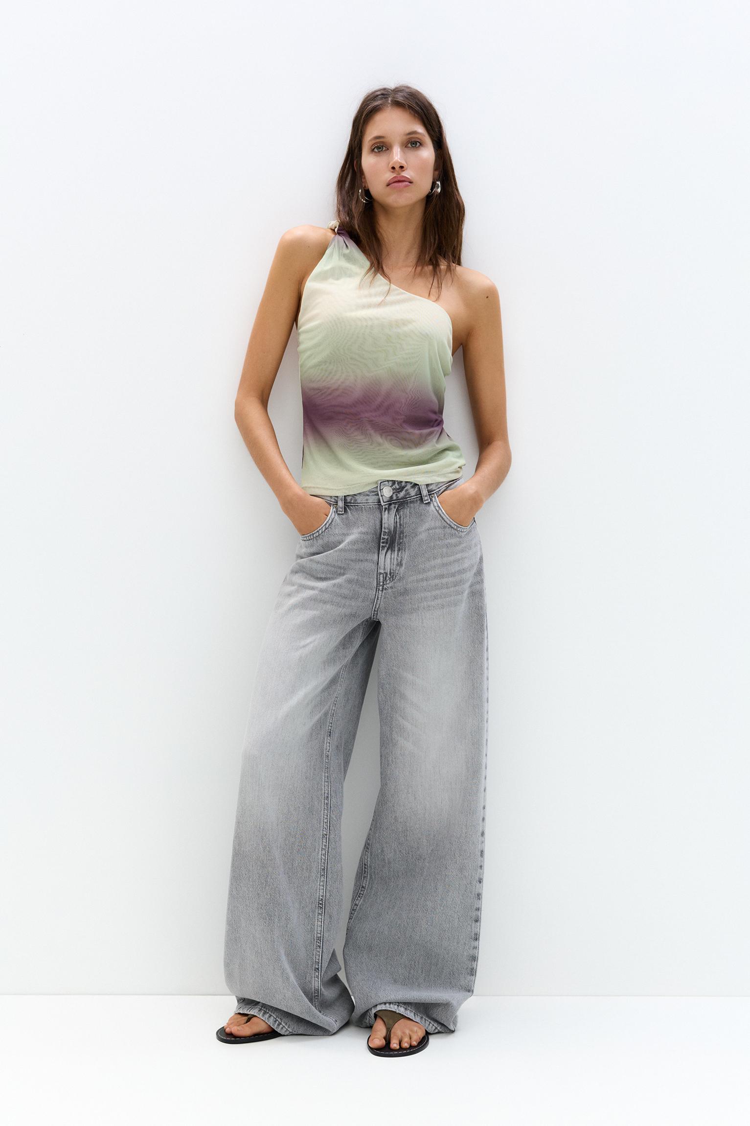 Asymmetric tulle top with a knotted strap Product Image