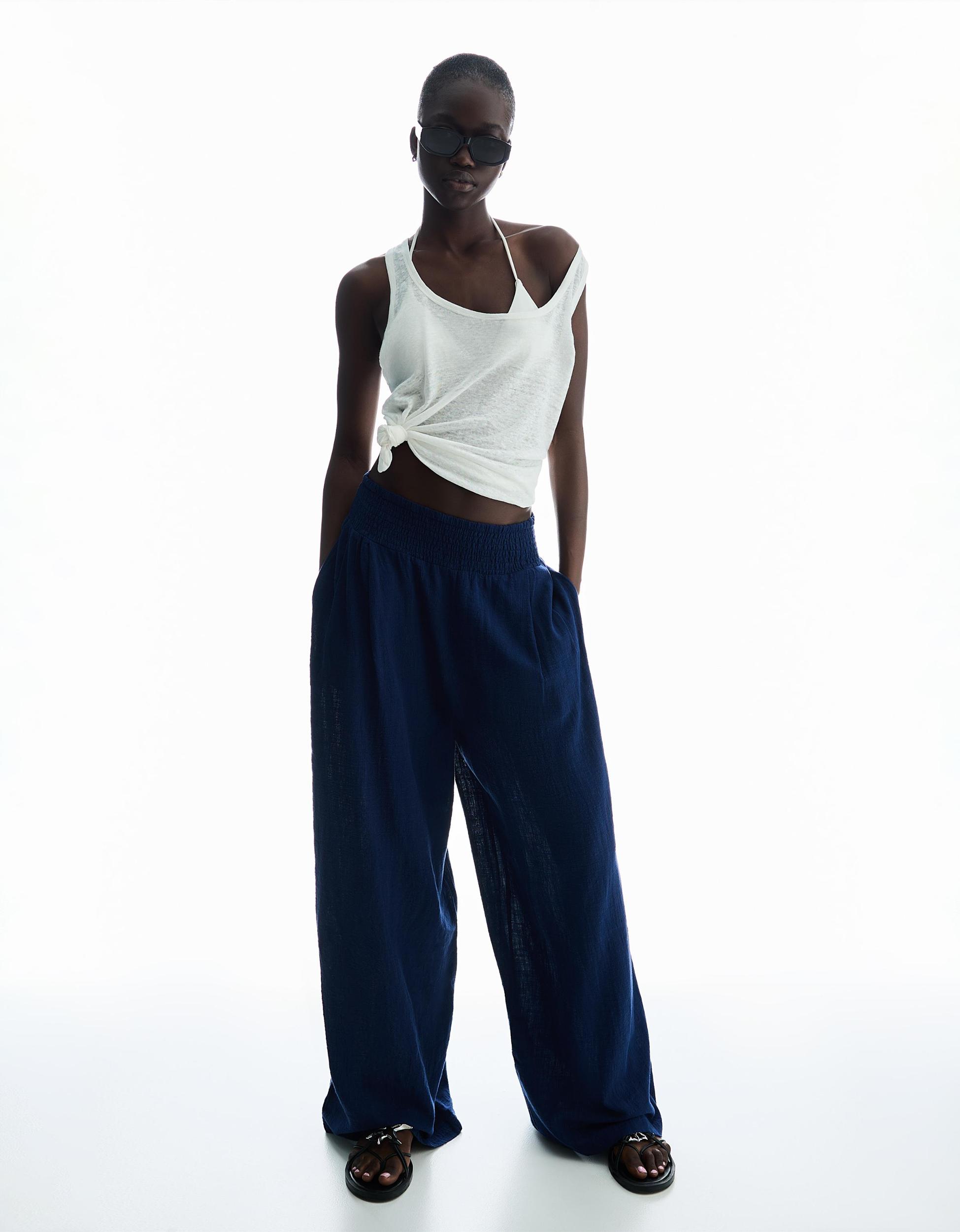 Rustic wide-leg pants with darts Product Image