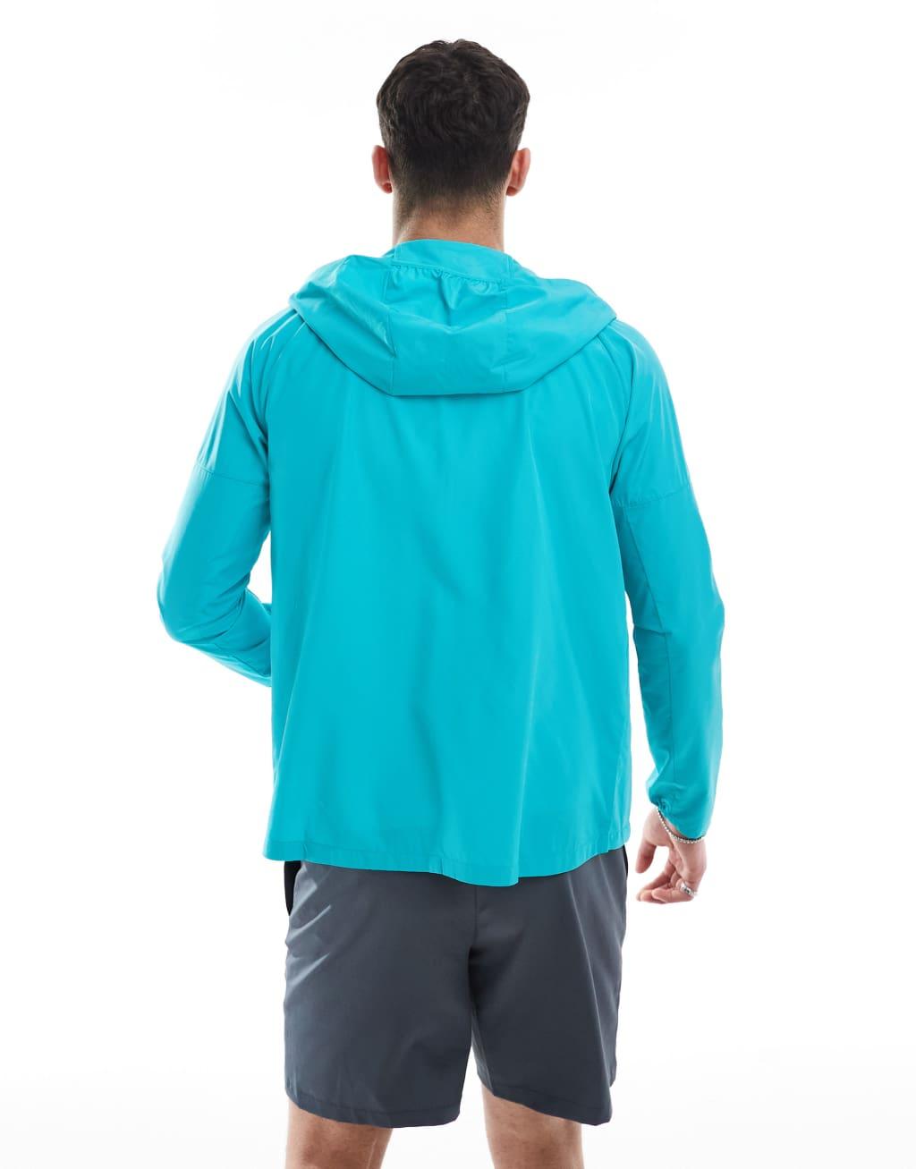 Nike Running Miler jacket in light blue Product Image