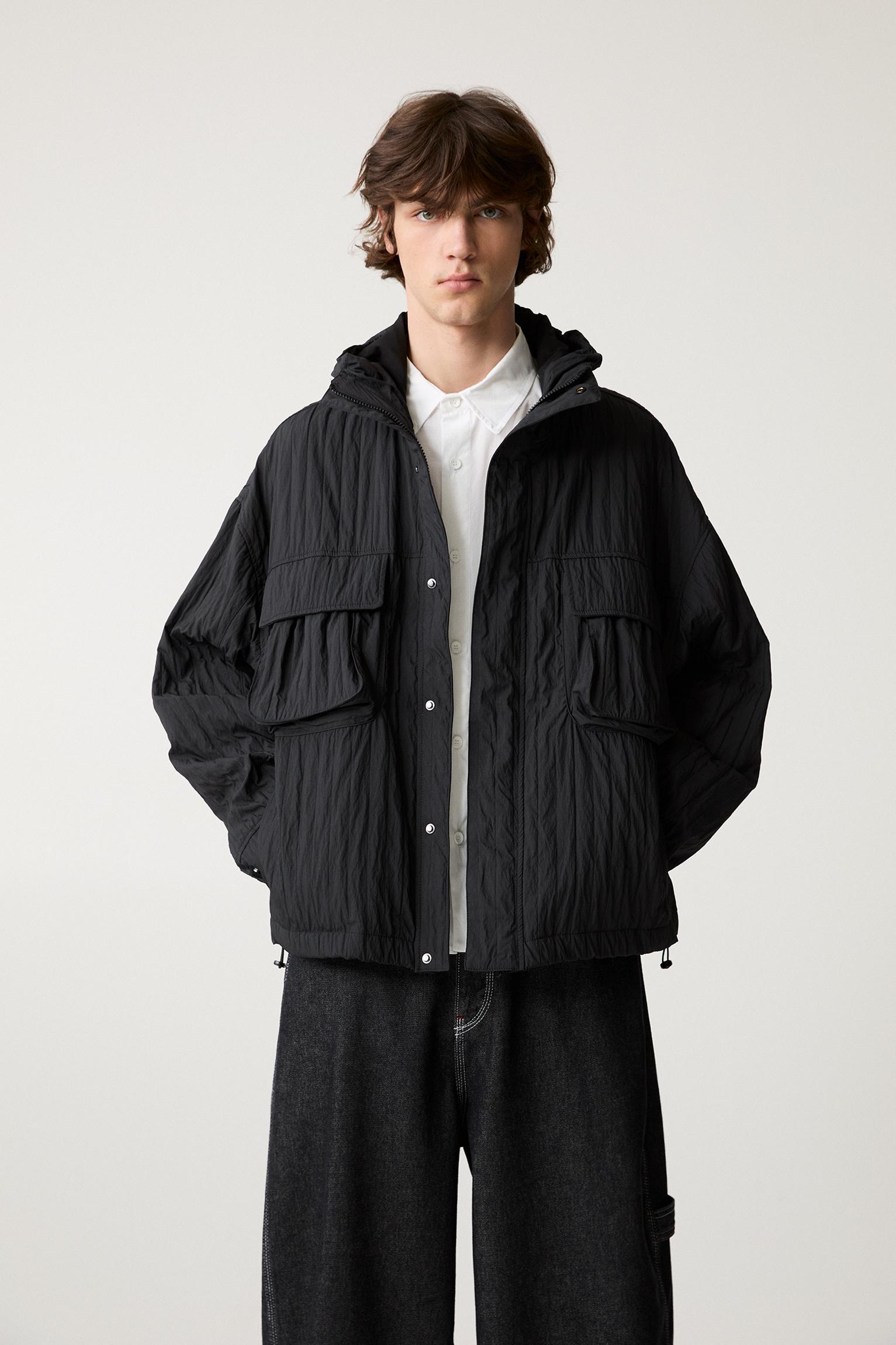 Creased raincoat with hood Product Image