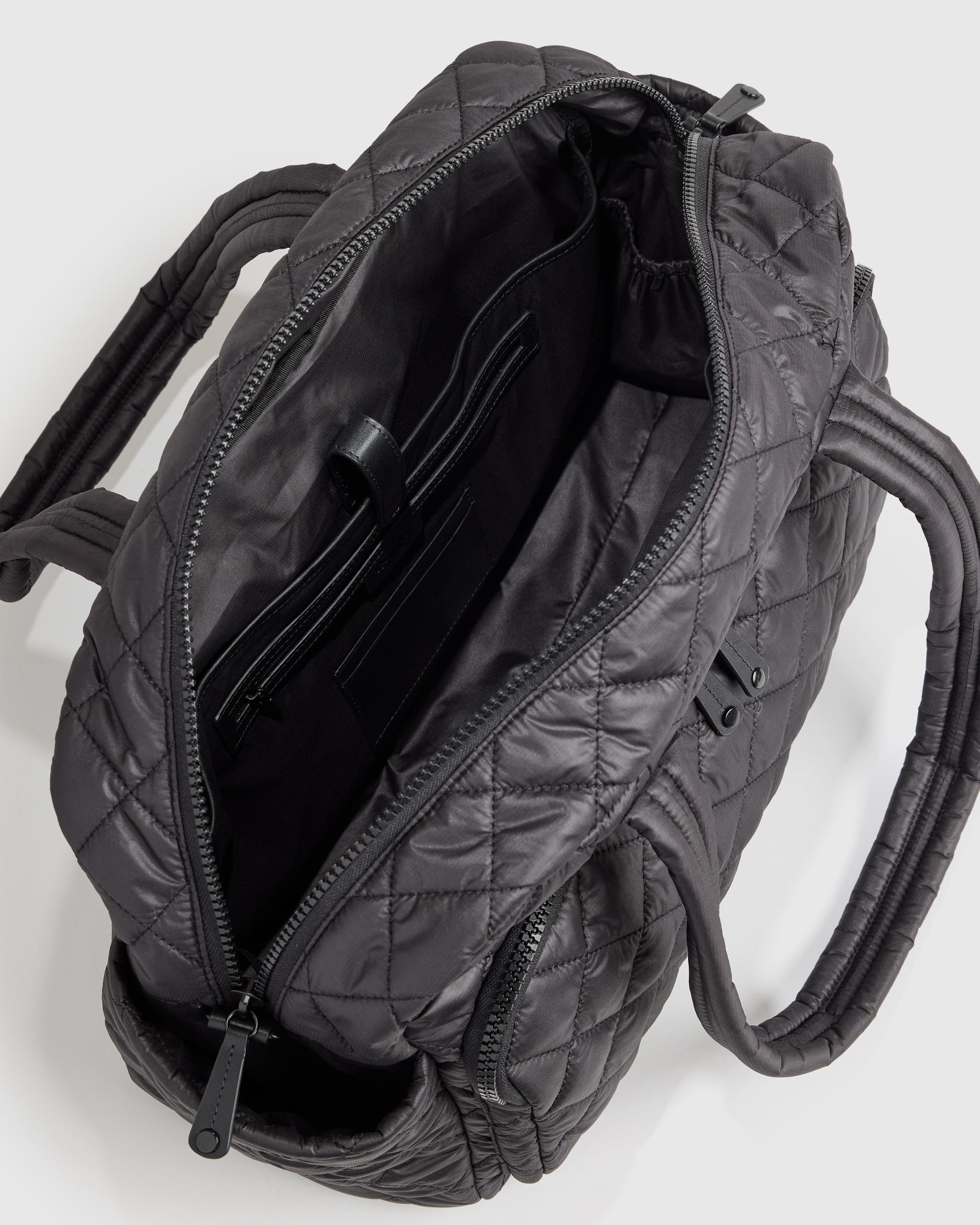 Quince | Women's Transit Quilted Duffle Bag in Black, Nylon Product Image