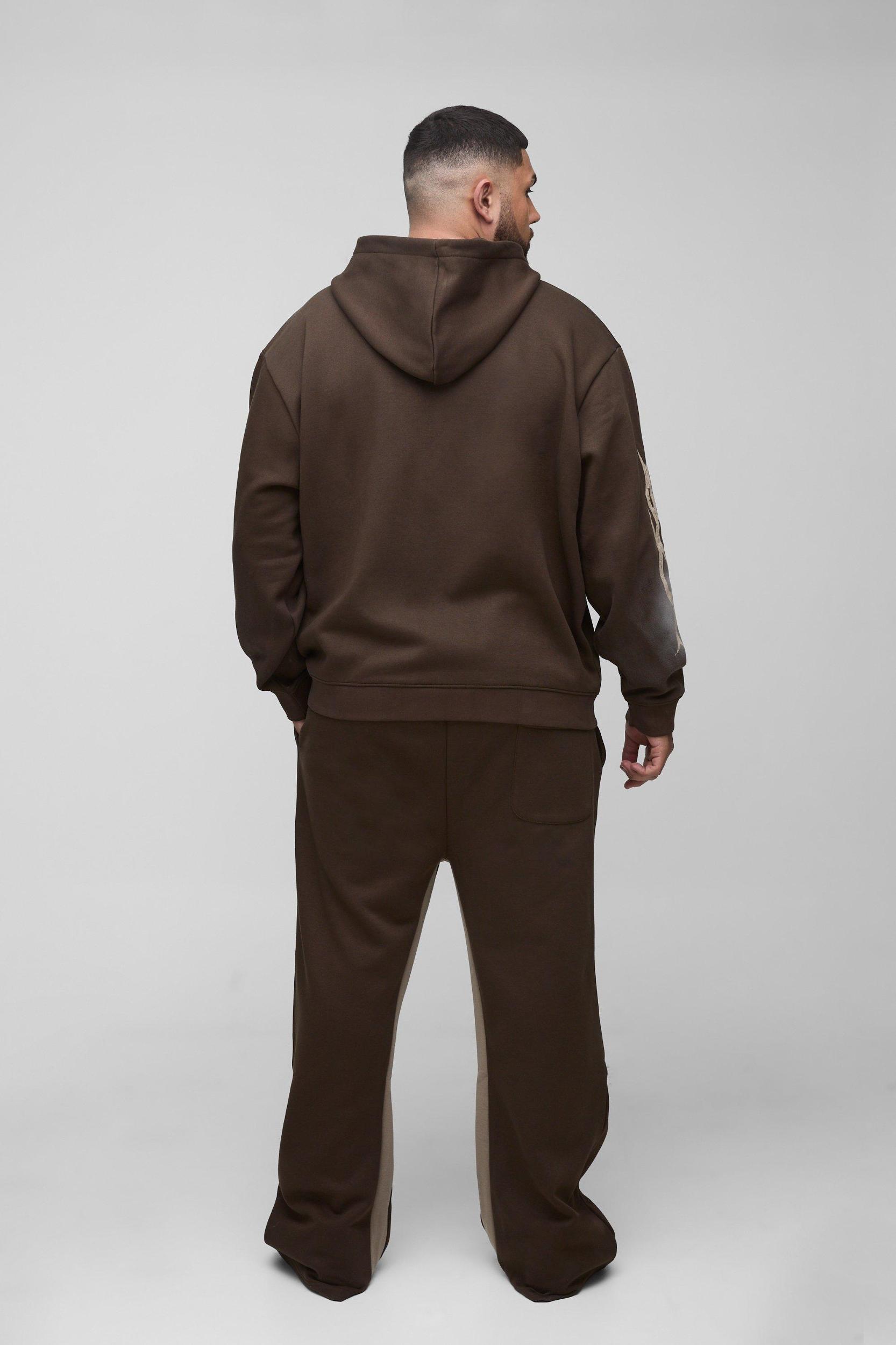 Plus Oversized Zip Thru Graphic Spray Wash Hooded Relaxed Flare Tracksuit | boohooMAN USA Product Image