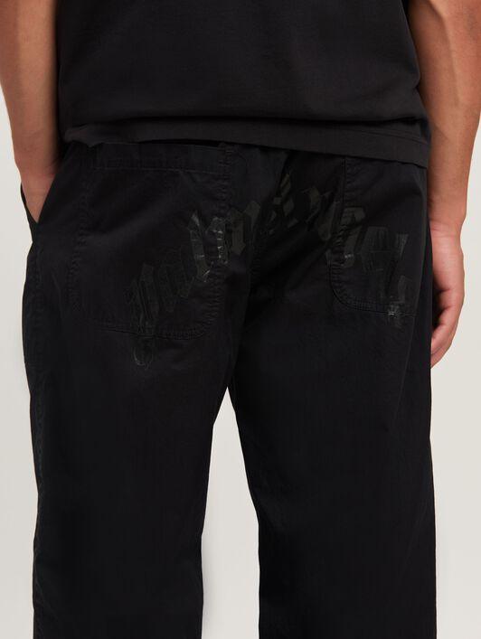 CURVED LOGO LOOSE PANTS Product Image