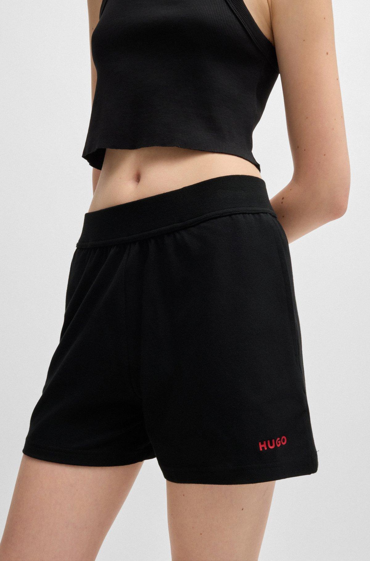Relaxed-fit shorts with silicone-printed logo Product Image