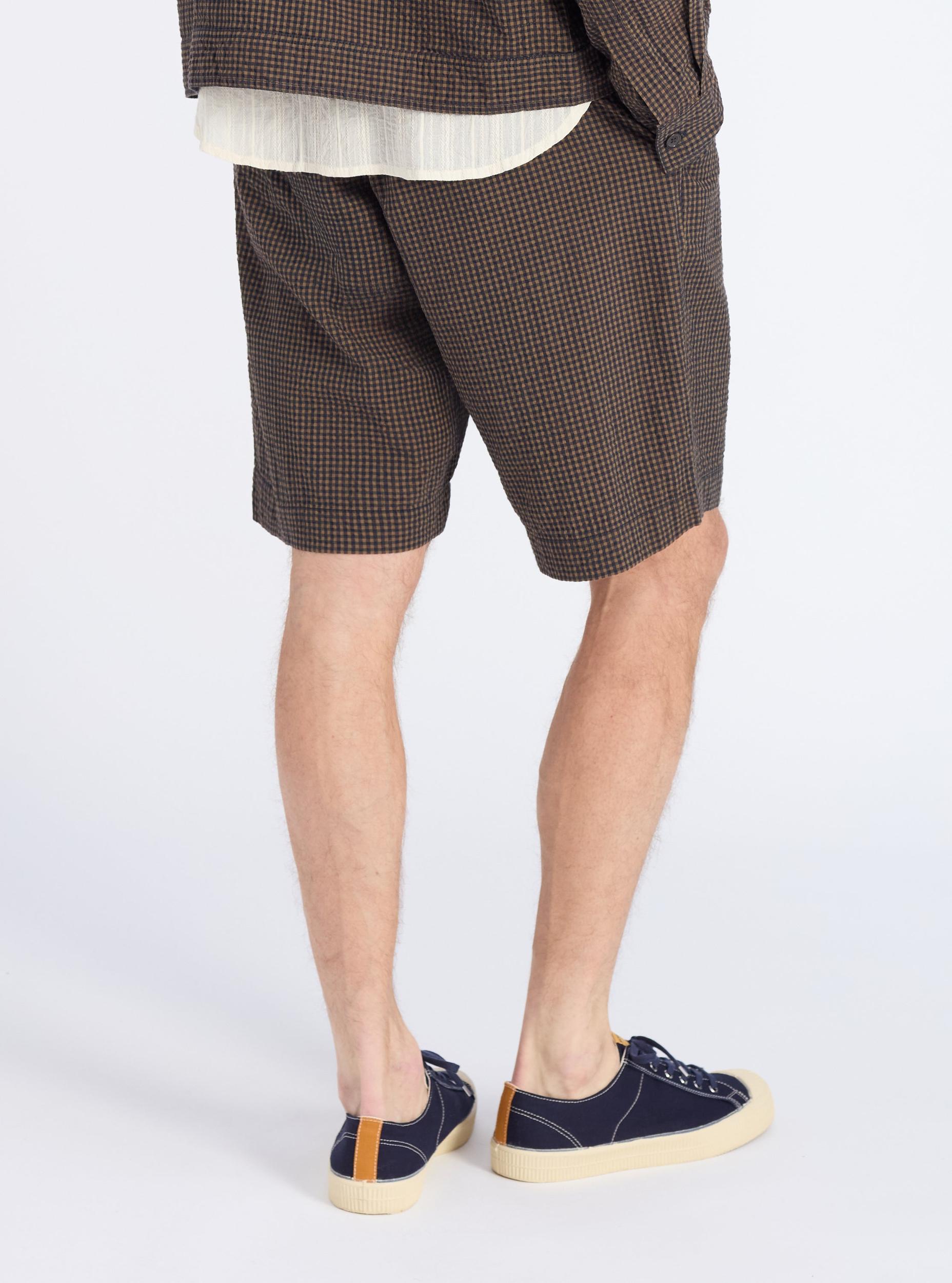 Universal Works Pleated Track Short in Navy Japanese Seersucker Product Image
