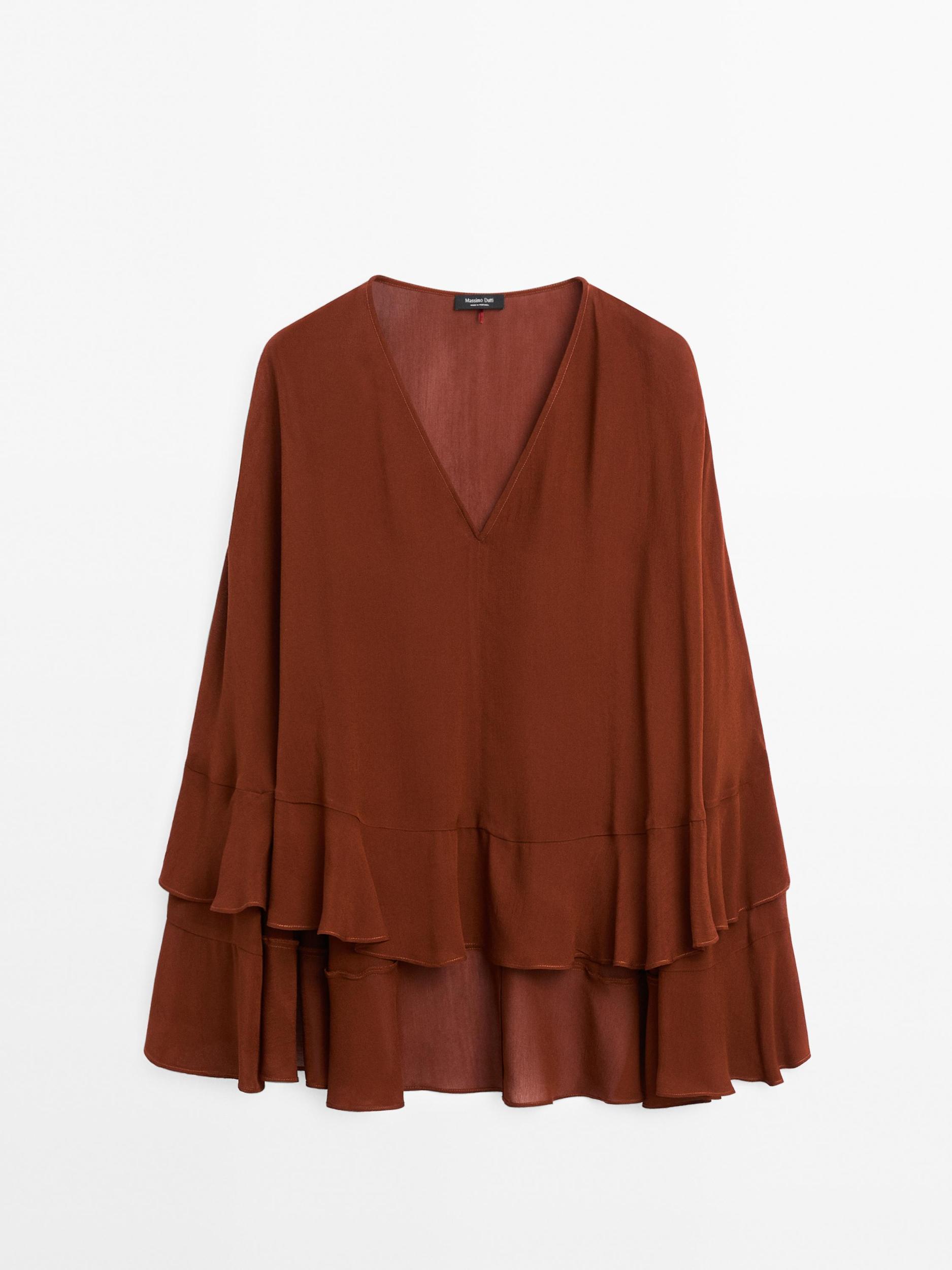 Cape-style blouse with ruffles Product Image