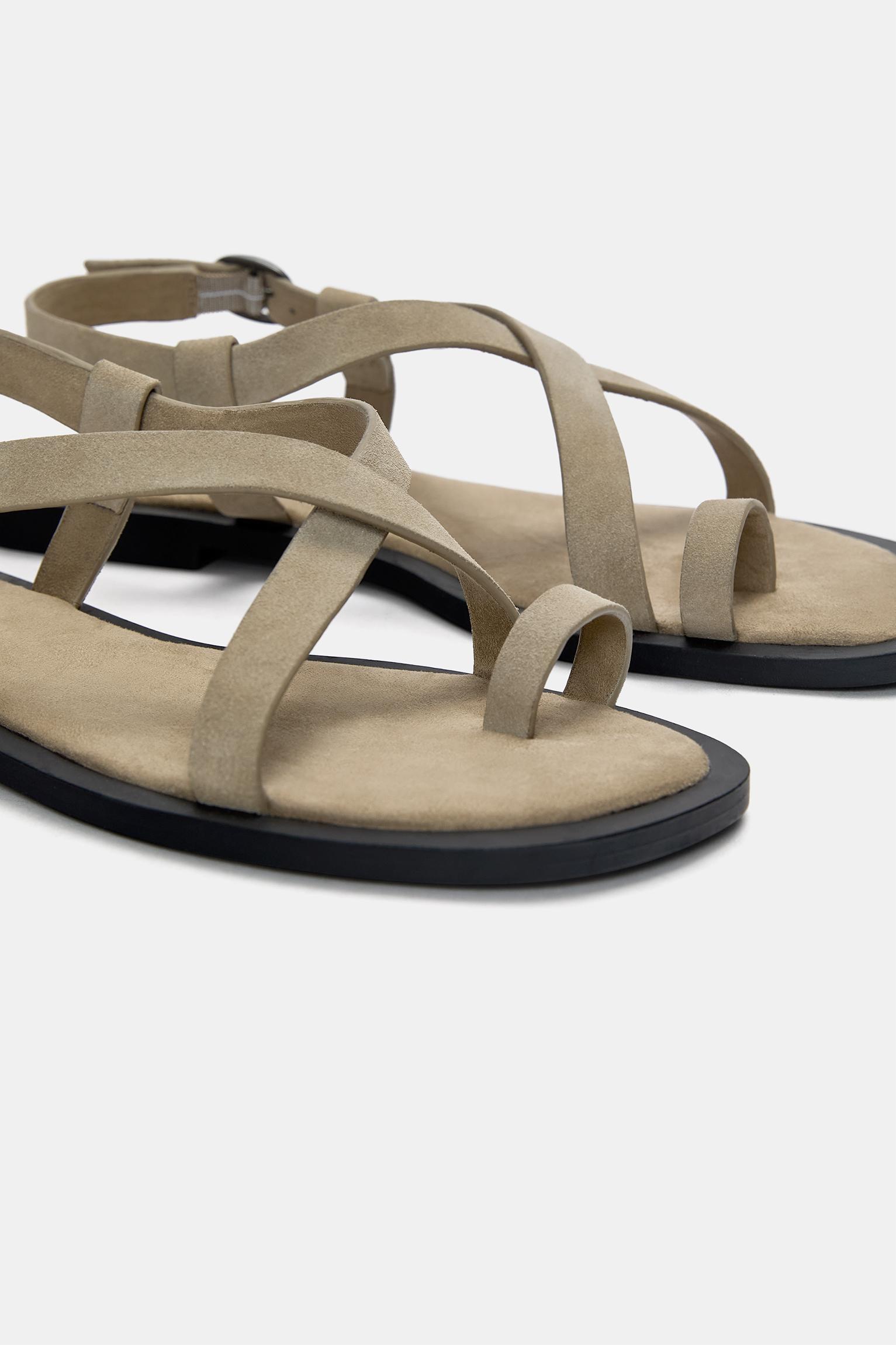 Strappy leather flat sandals Product Image