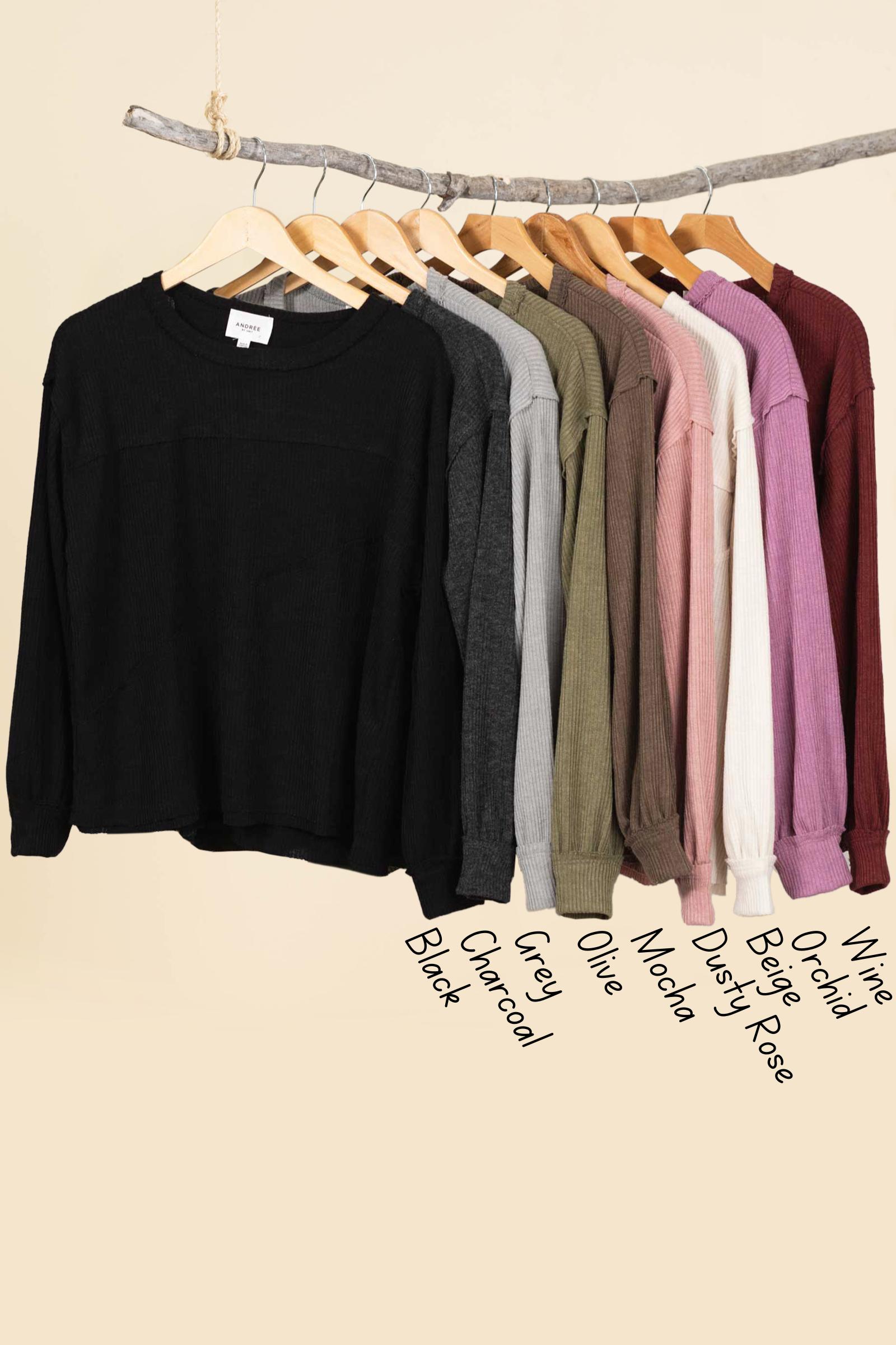 Solid Knit Top With Asymmetrical Exposed Seams Product Image