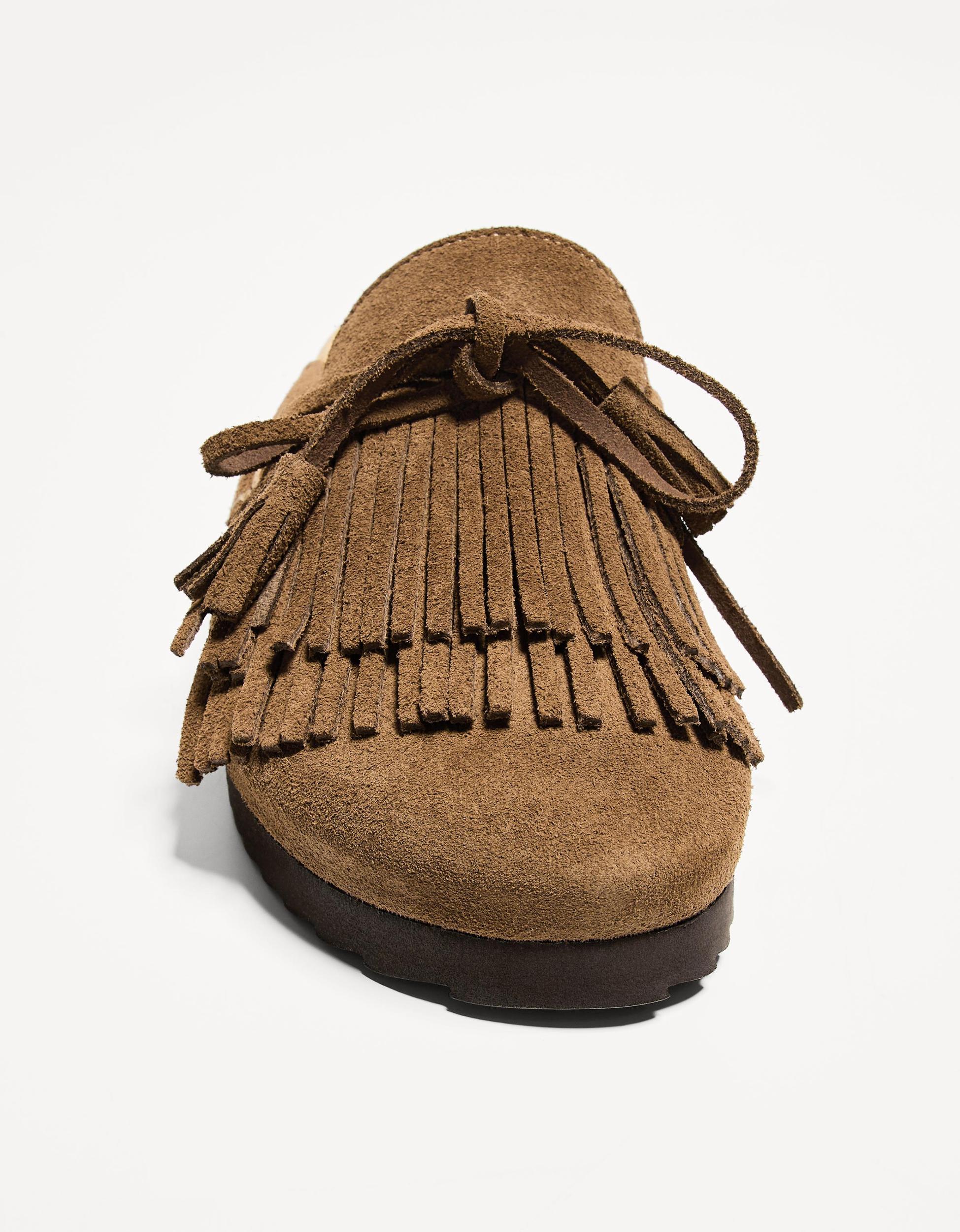 Flat LEATHER clogs with fringe detail Product Image