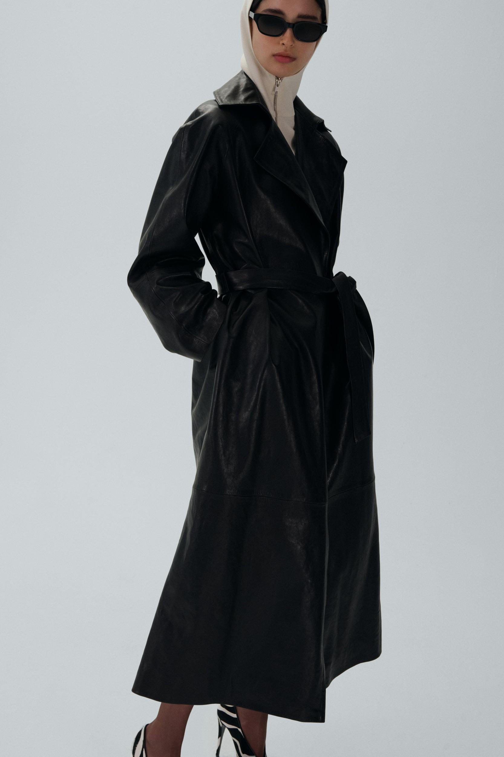 Belted leather wrap coat in black Product Image