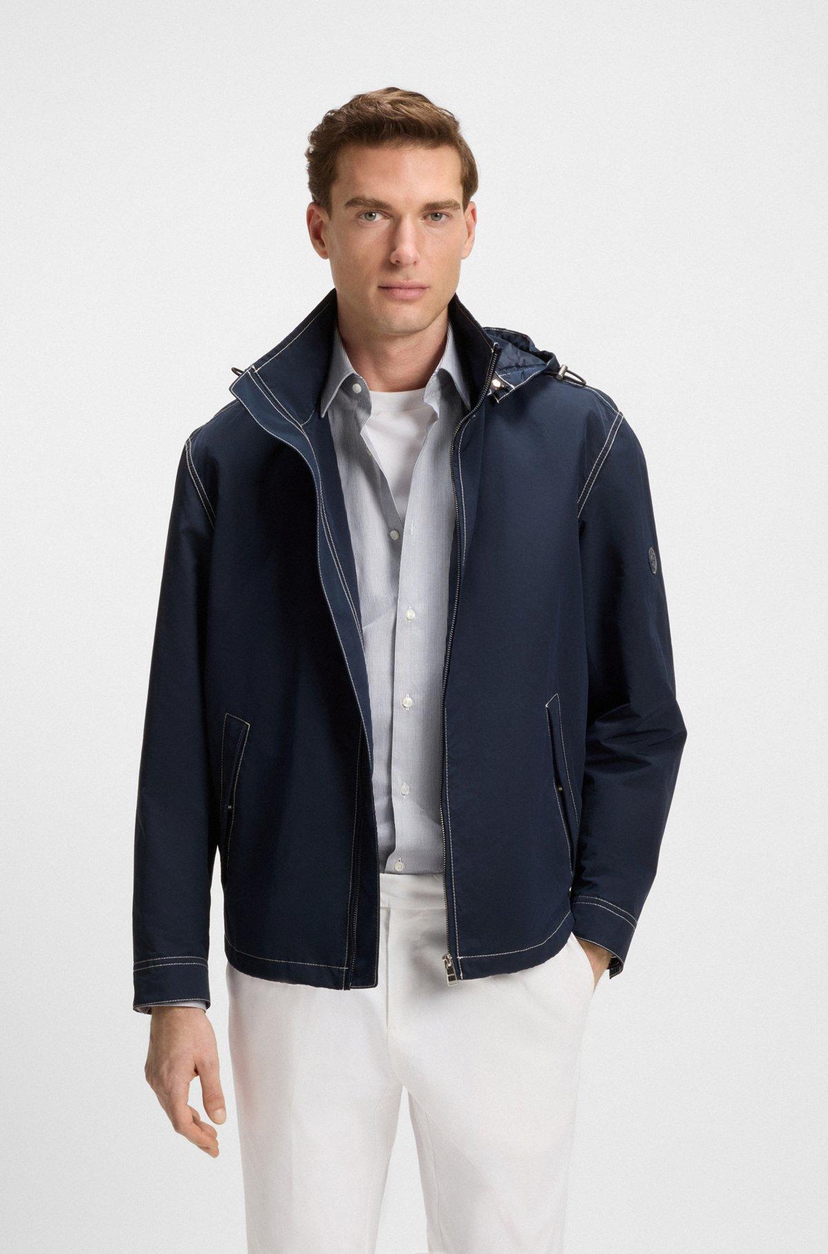 Packable hooded jacket in water-repellent mixed fabrics Product Image