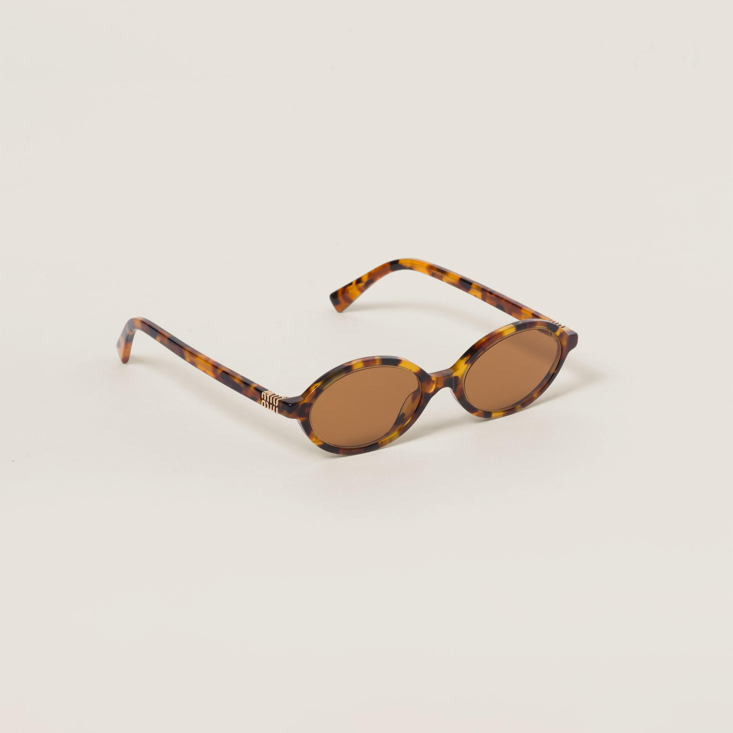 MIU MIU 0mu 04zs19p2z1 In Brown Product Image