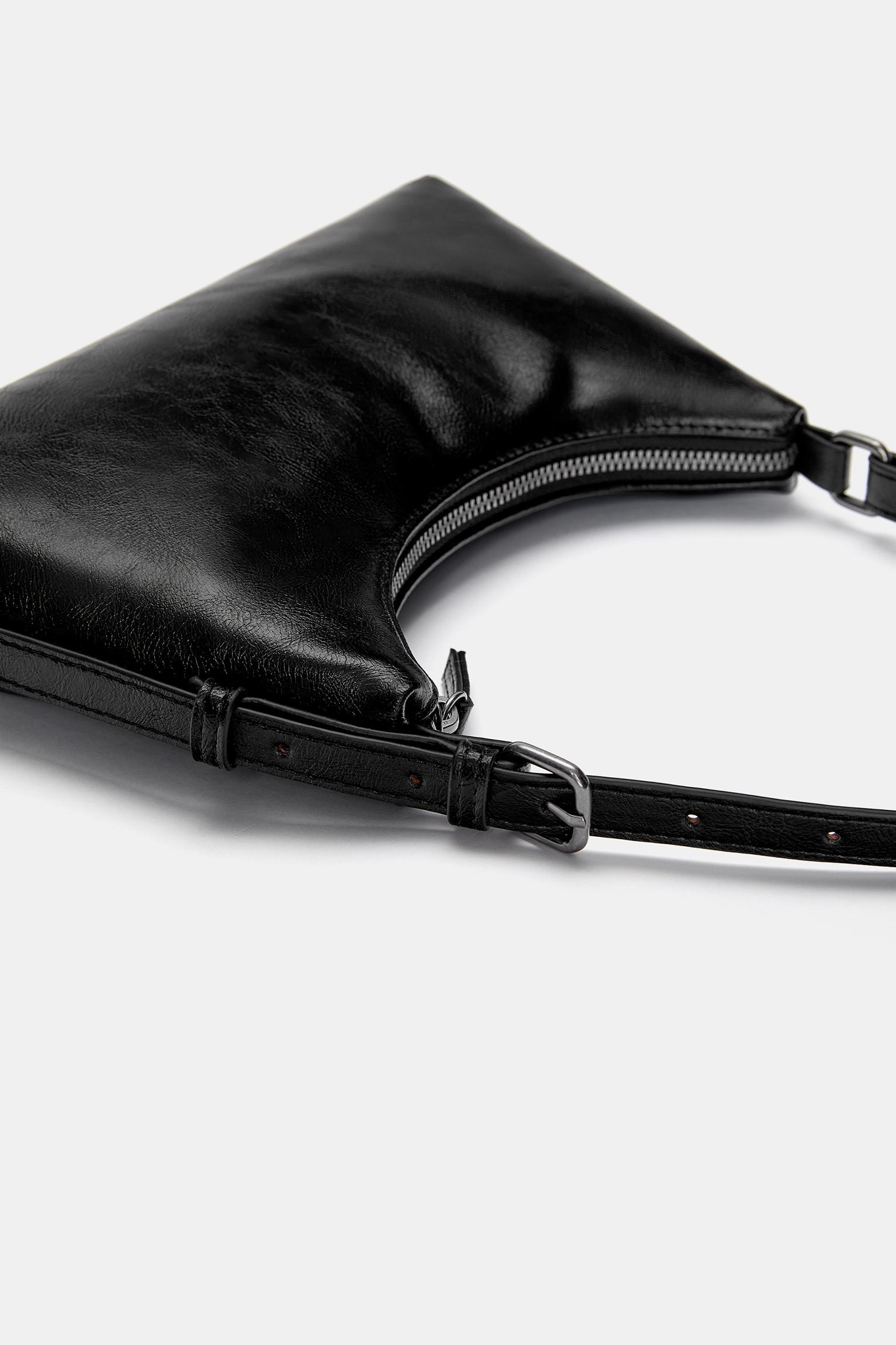 Shoulder bag with buckles Product Image