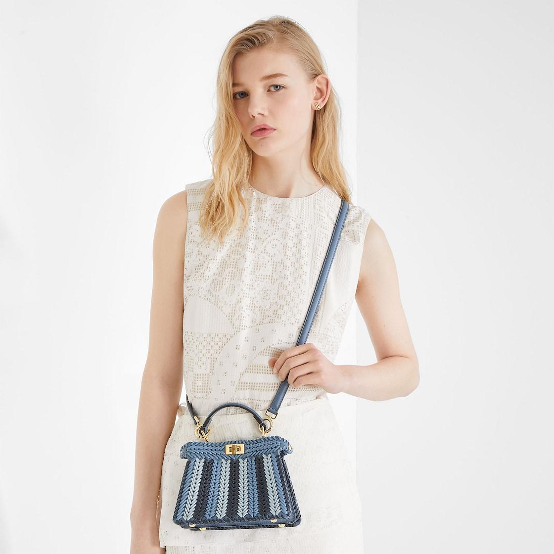 Peekaboo ISeeU PetiteBlueberry-colored interlaced leather bag Product Image