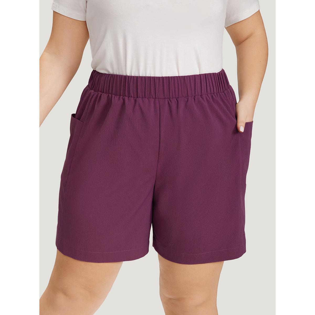 Plus Size Solid Patched Pocket Elastic Waist Shorts Women Purple Casual Elastic Waist Dailywear Shorts BloomChic 12/L Product Image
