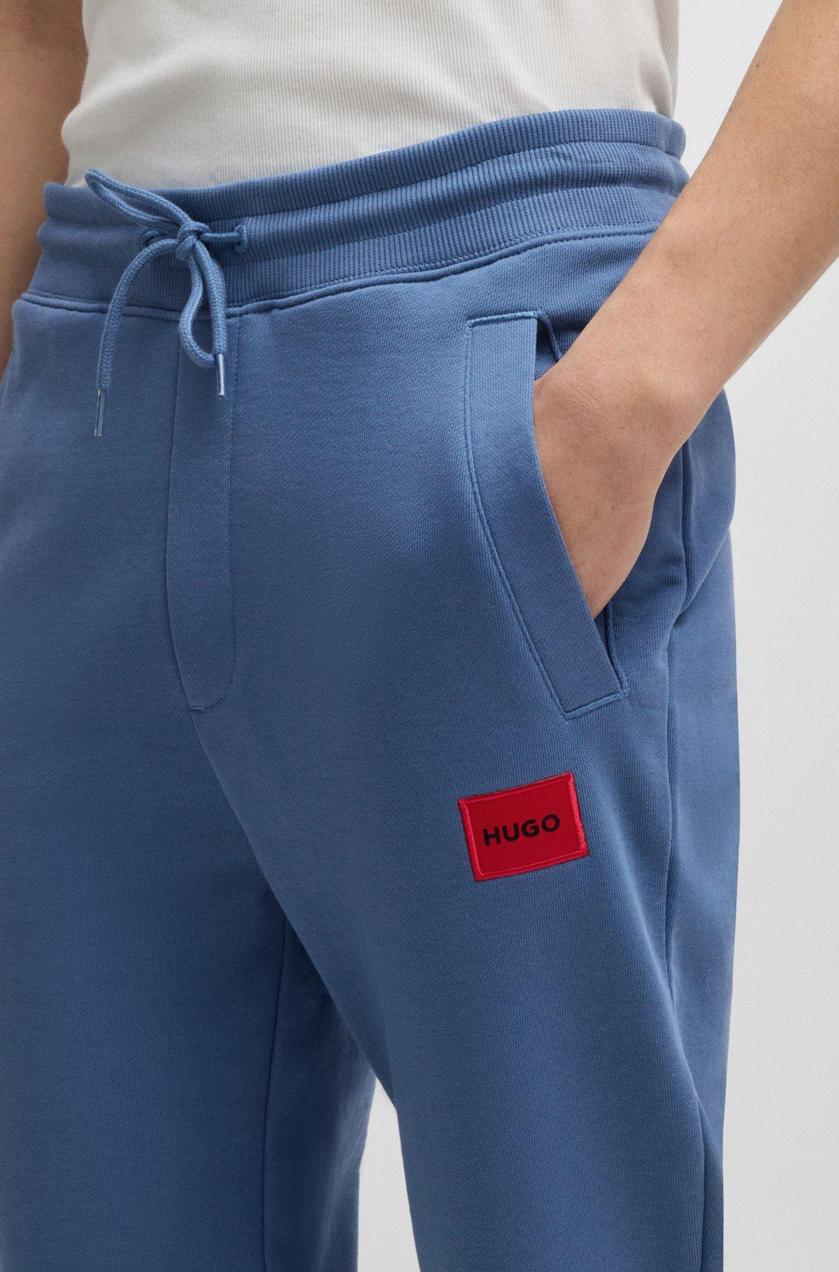 Logo-label tracksuit bottoms in cotton terry Product Image