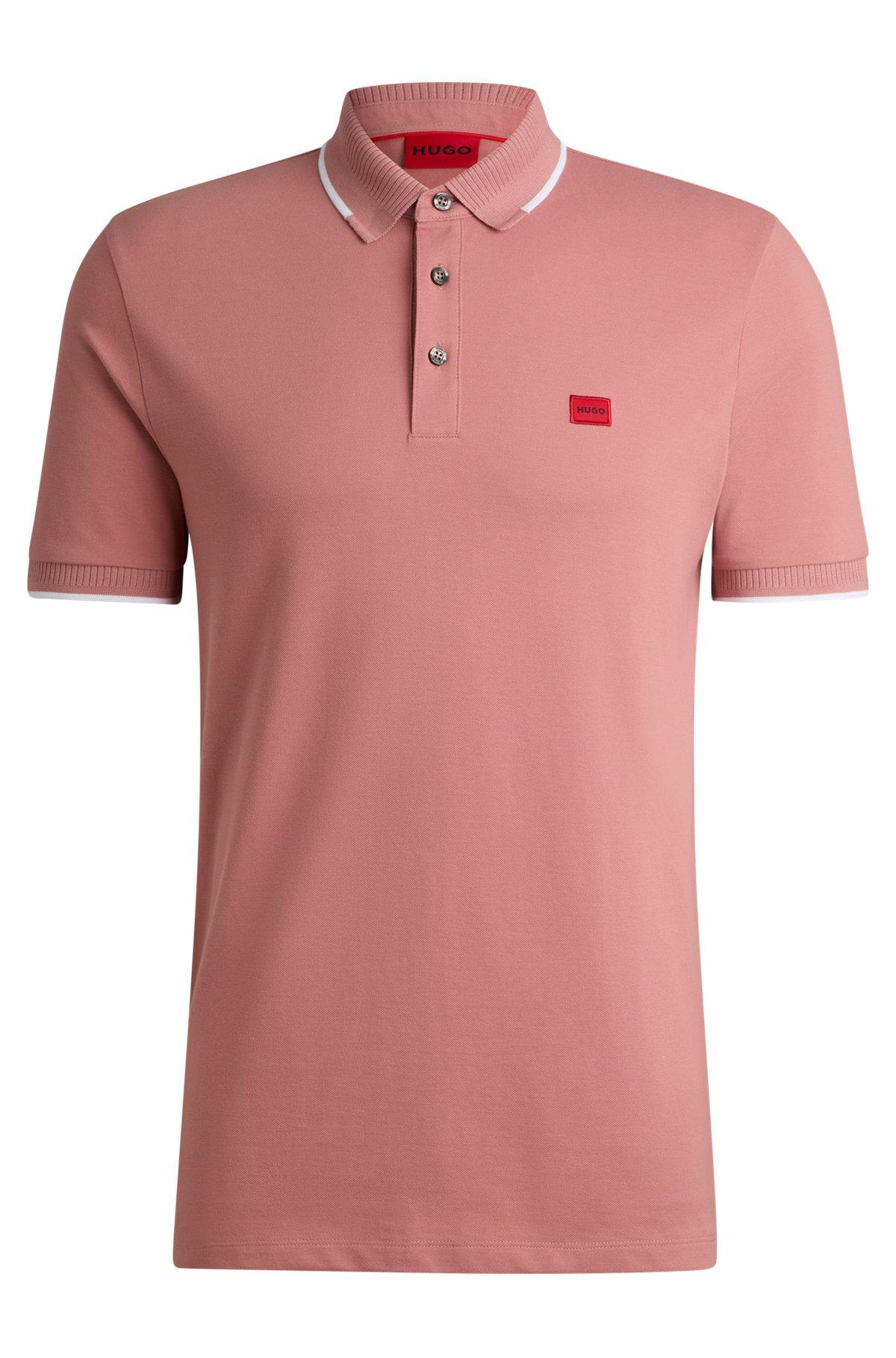 Slim-fit polo shirt with red logo label Product Image