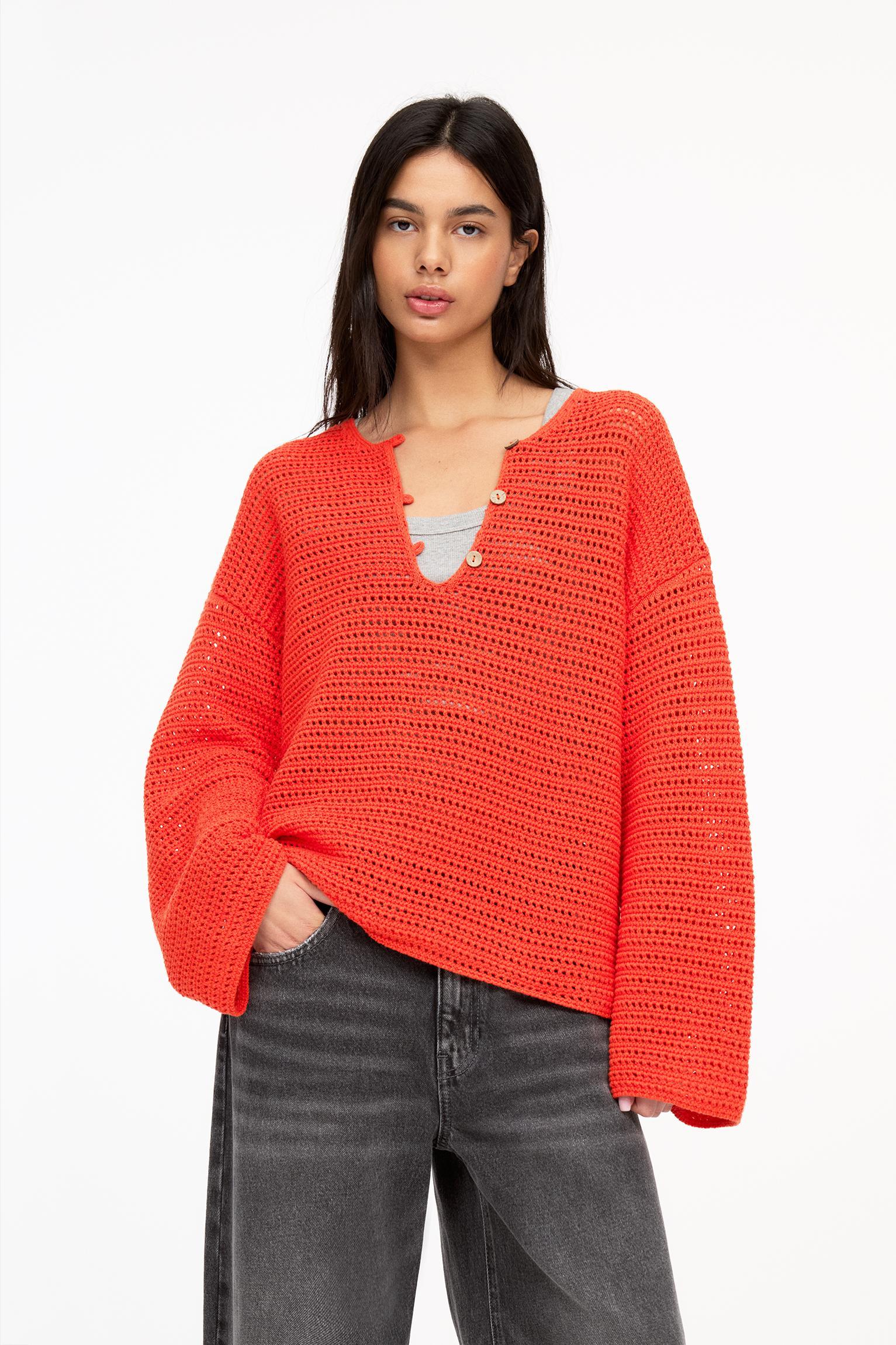 Open knit sweater with buttons Product Image