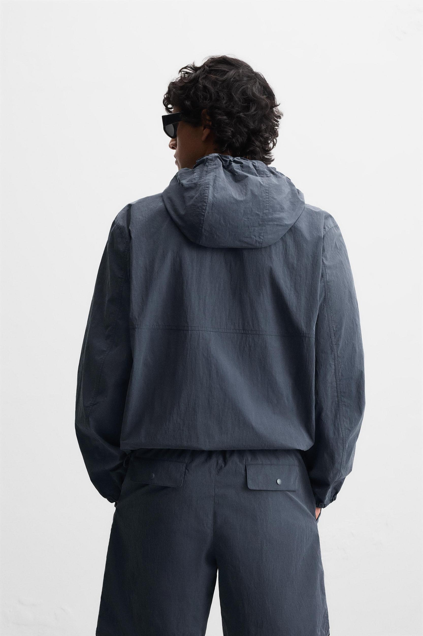 HOODED TECHNICAL JACKET Product Image
