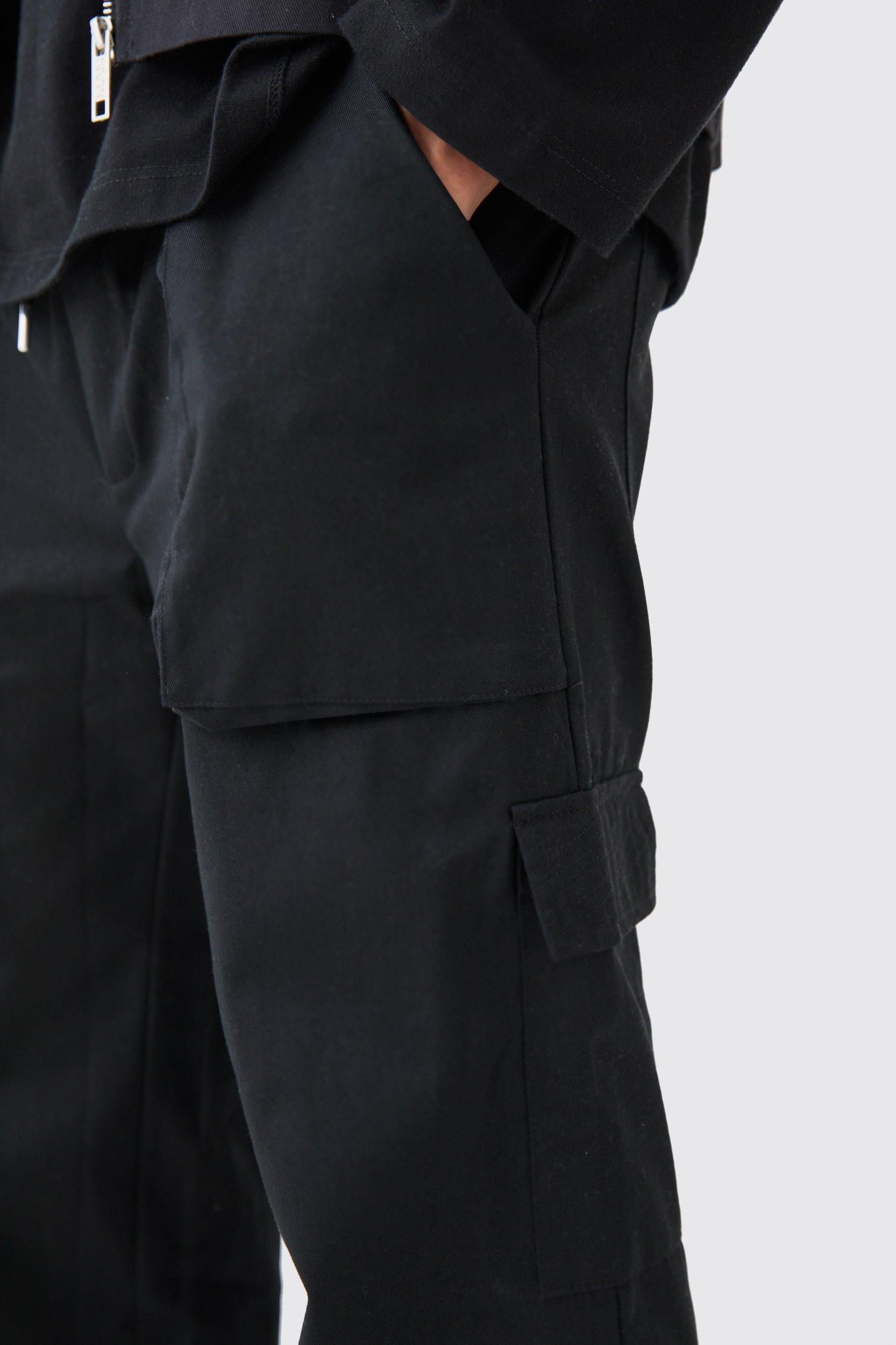 Elasticated Waist Zip Hem Flared Cargo Pants | boohooMAN USA Product Image