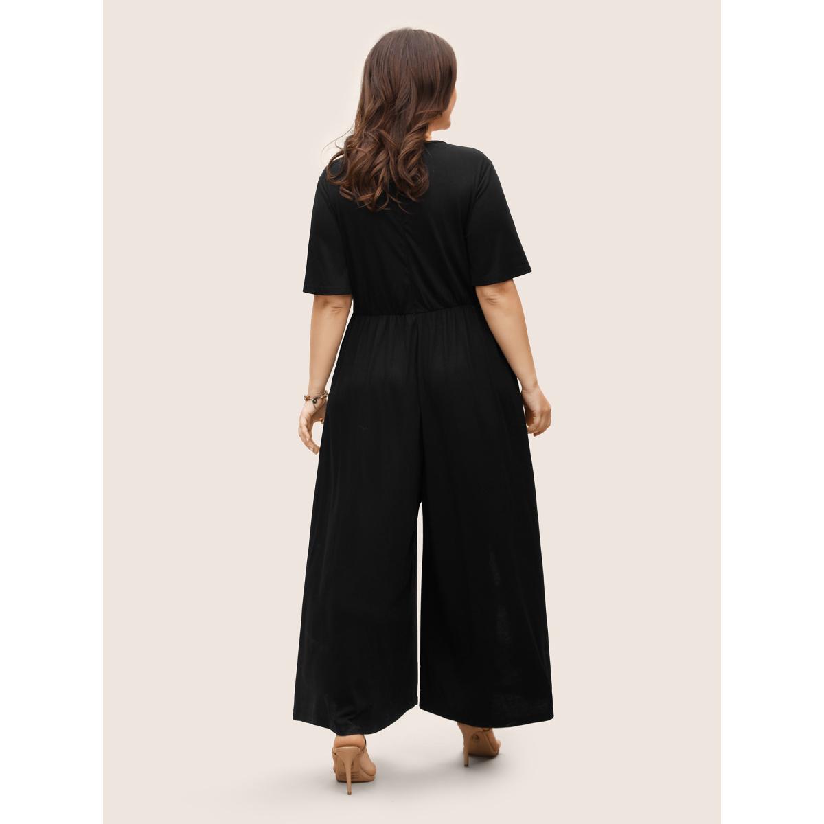 Plus Size Black V Neck Lace Panel Frill Trim Jumpsuit Women Resort Short sleeve V-neck Vacation Loose Jumpsuits BloomChic 26/4X Product Image