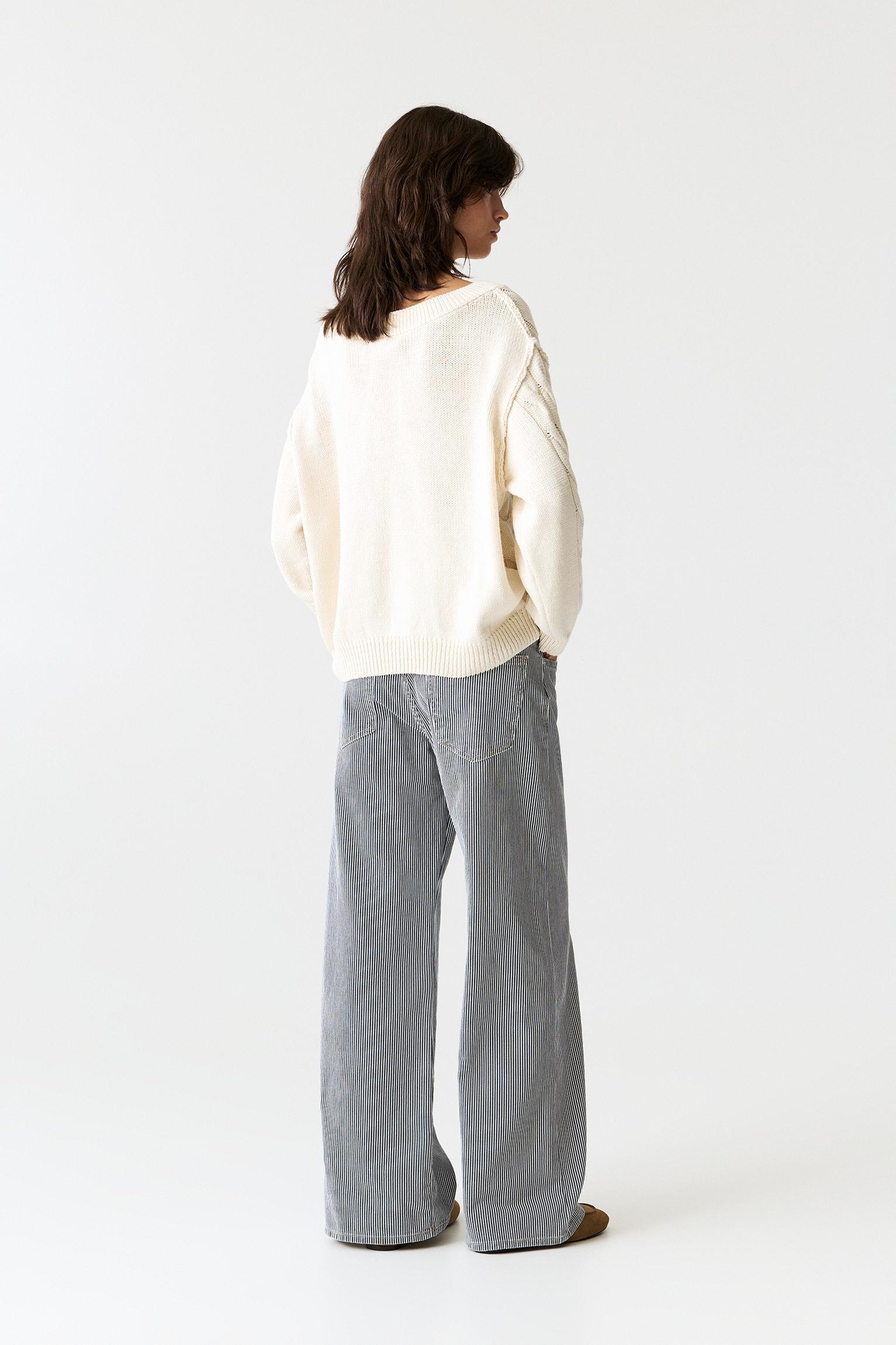 Asymmetric cable-knit sweater Product Image