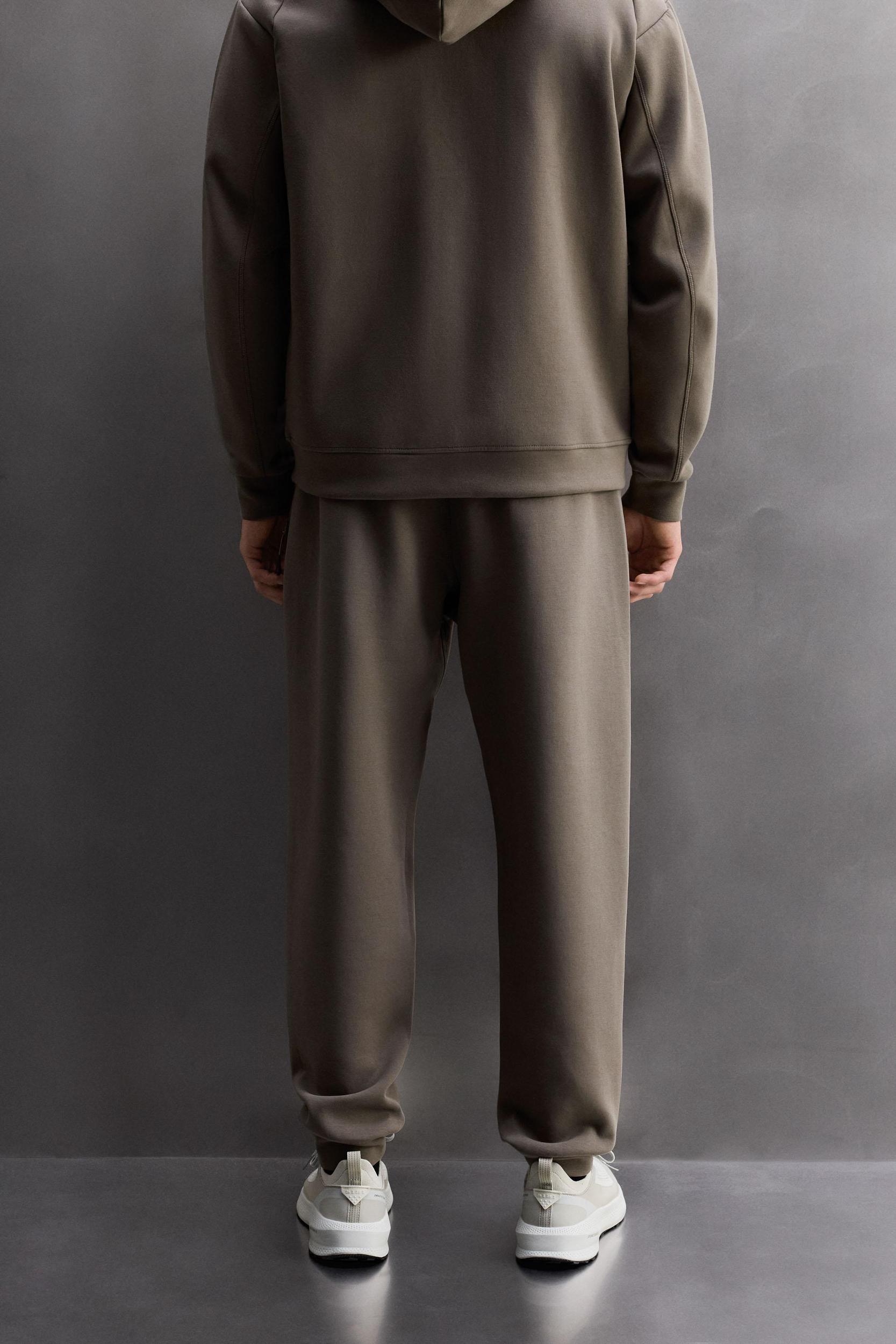 TECHNICAL ZIPPER PANTS Product Image