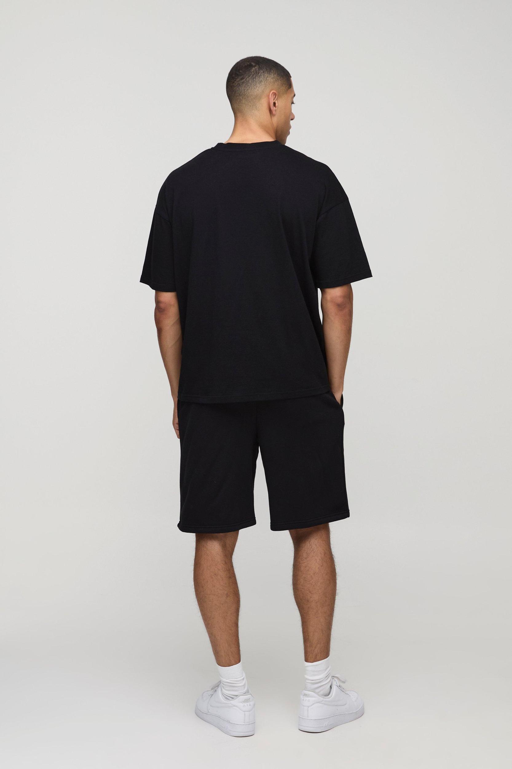Oversized Moto Graphic T-Shirt & Short Set | boohooMAN USA Product Image