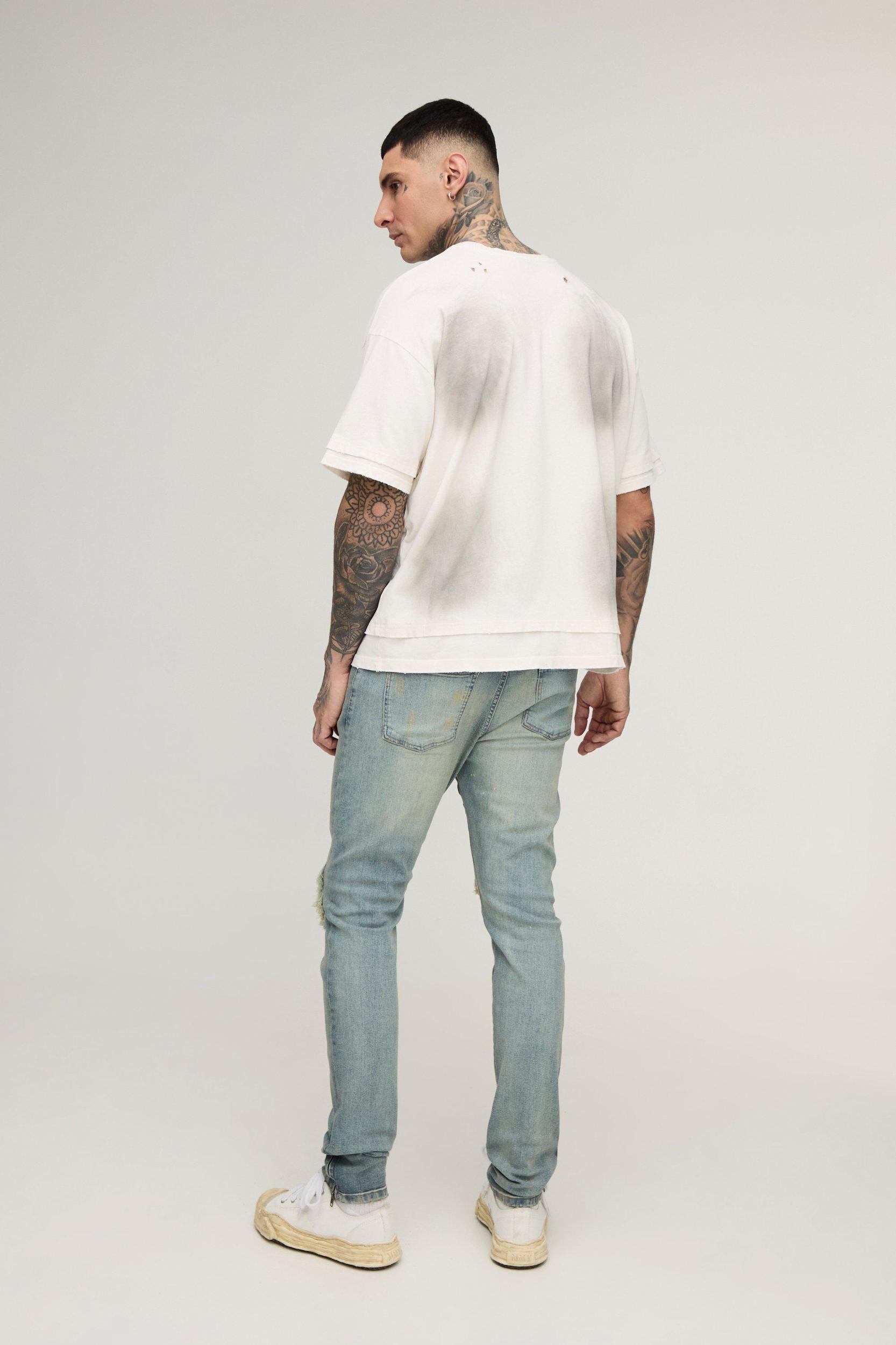 Tall Biker Rip & Repair Stonewash Zip Hem Skinny Jeans | boohooMAN USA Product Image