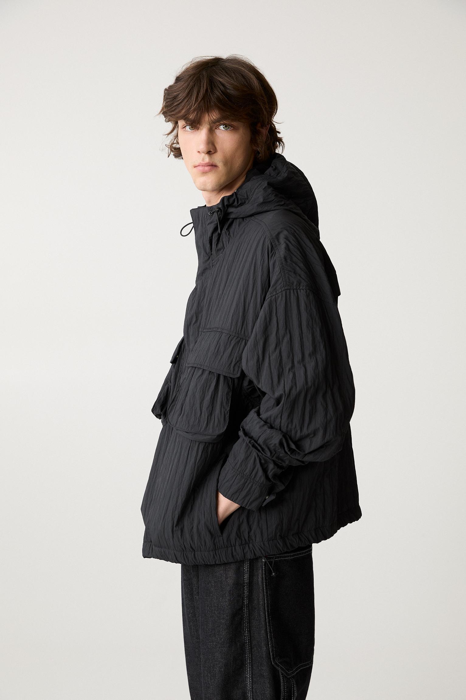 Creased raincoat with hood Product Image