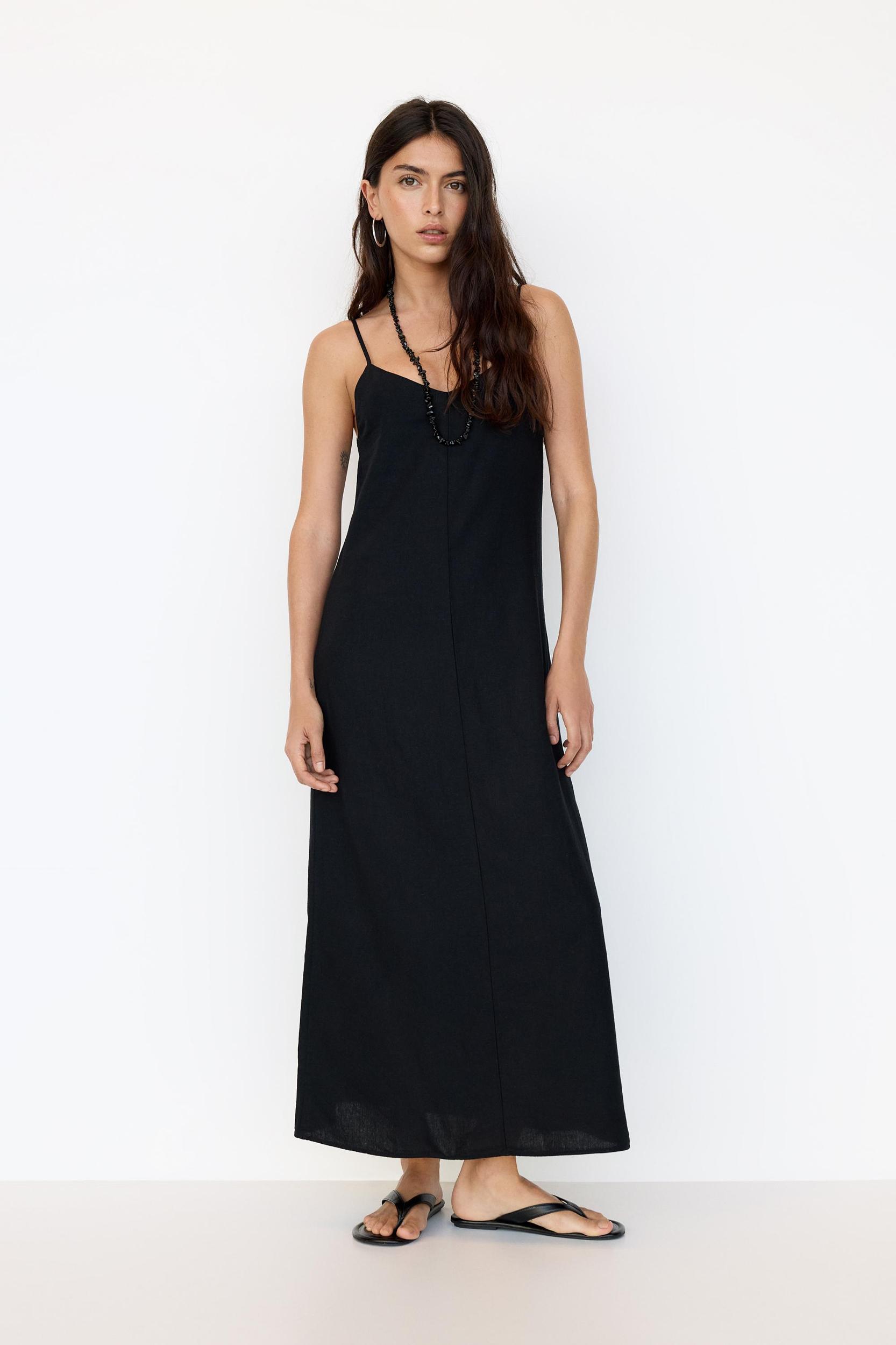 Rustic midi dress with straps Product Image
