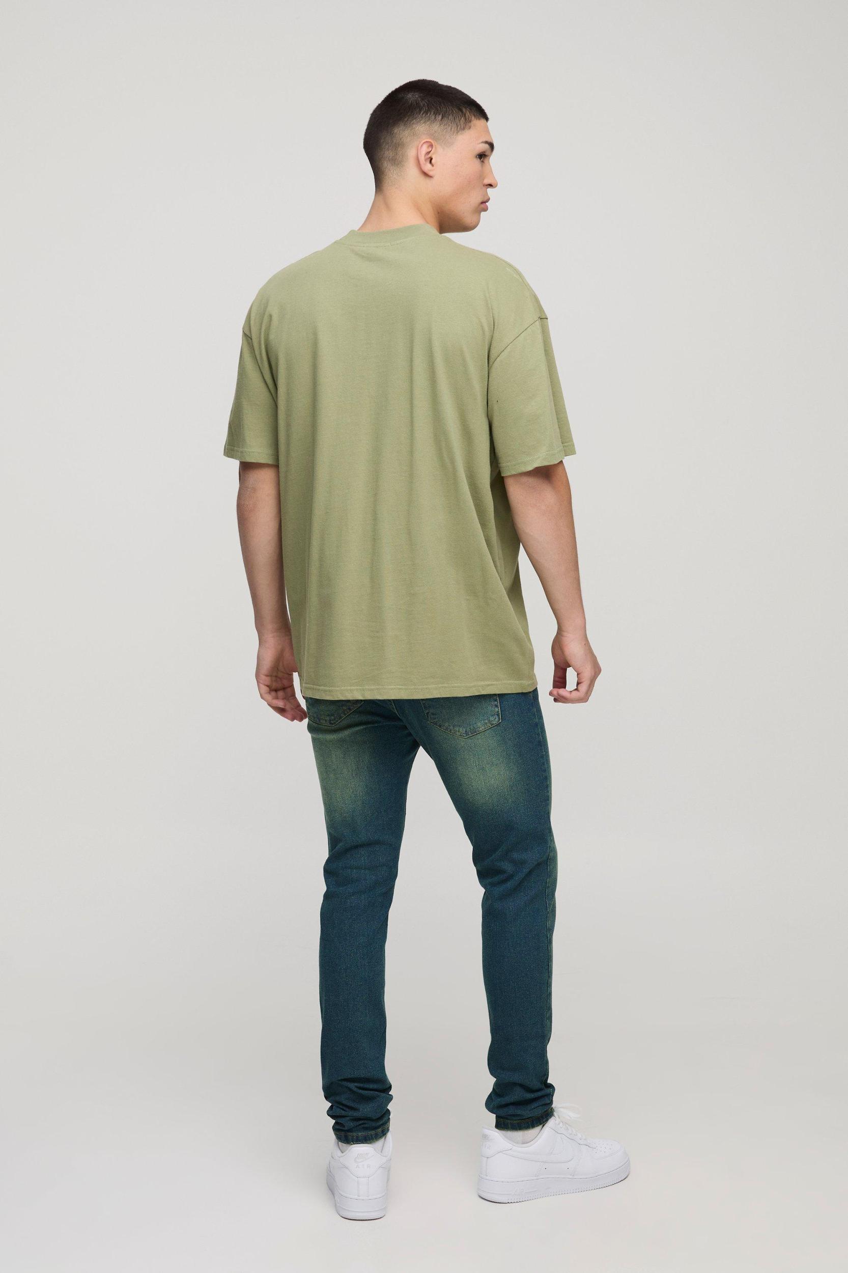 Skinny Washed Vintage Blue Ripped Jeans | boohooMAN USA Product Image