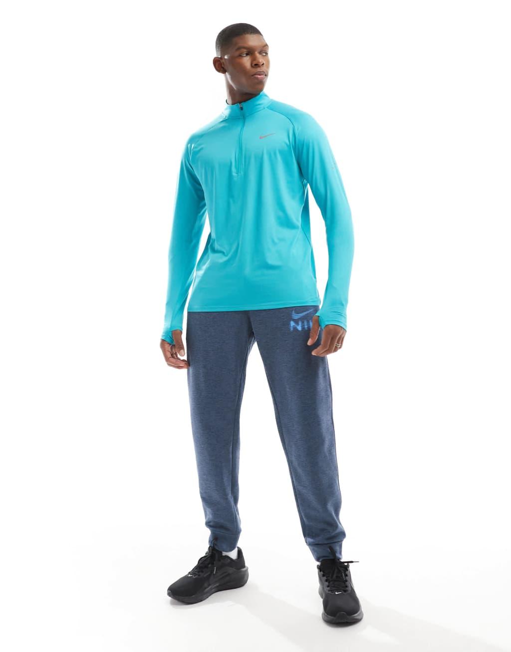 Nike Running Stride half zip sweatshirt in light blue Product Image